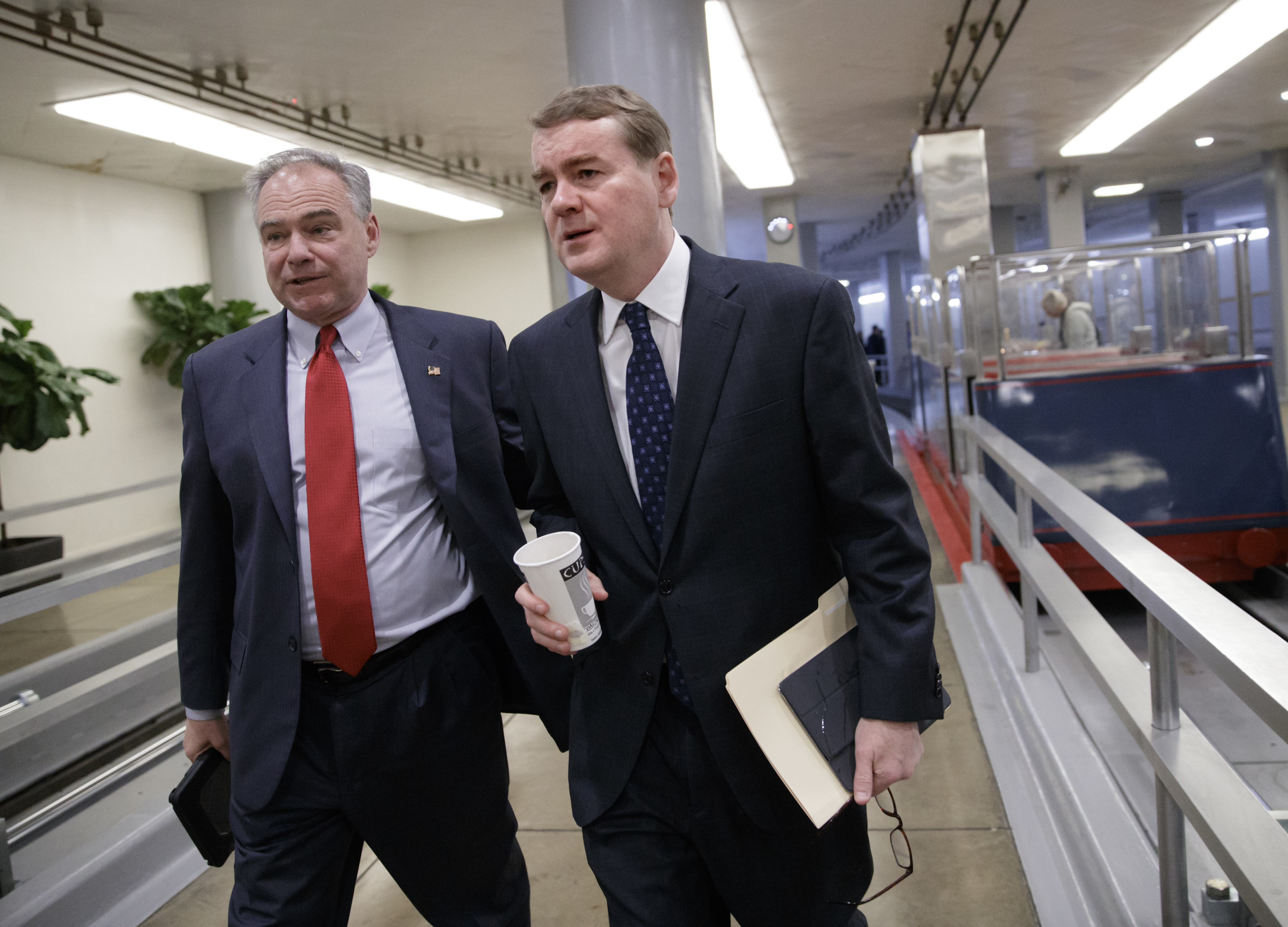 Sens. Tim Kaine (D-VA) and Michael Bennet (D-CO) (AP Photo/J. Scott Applewhite)