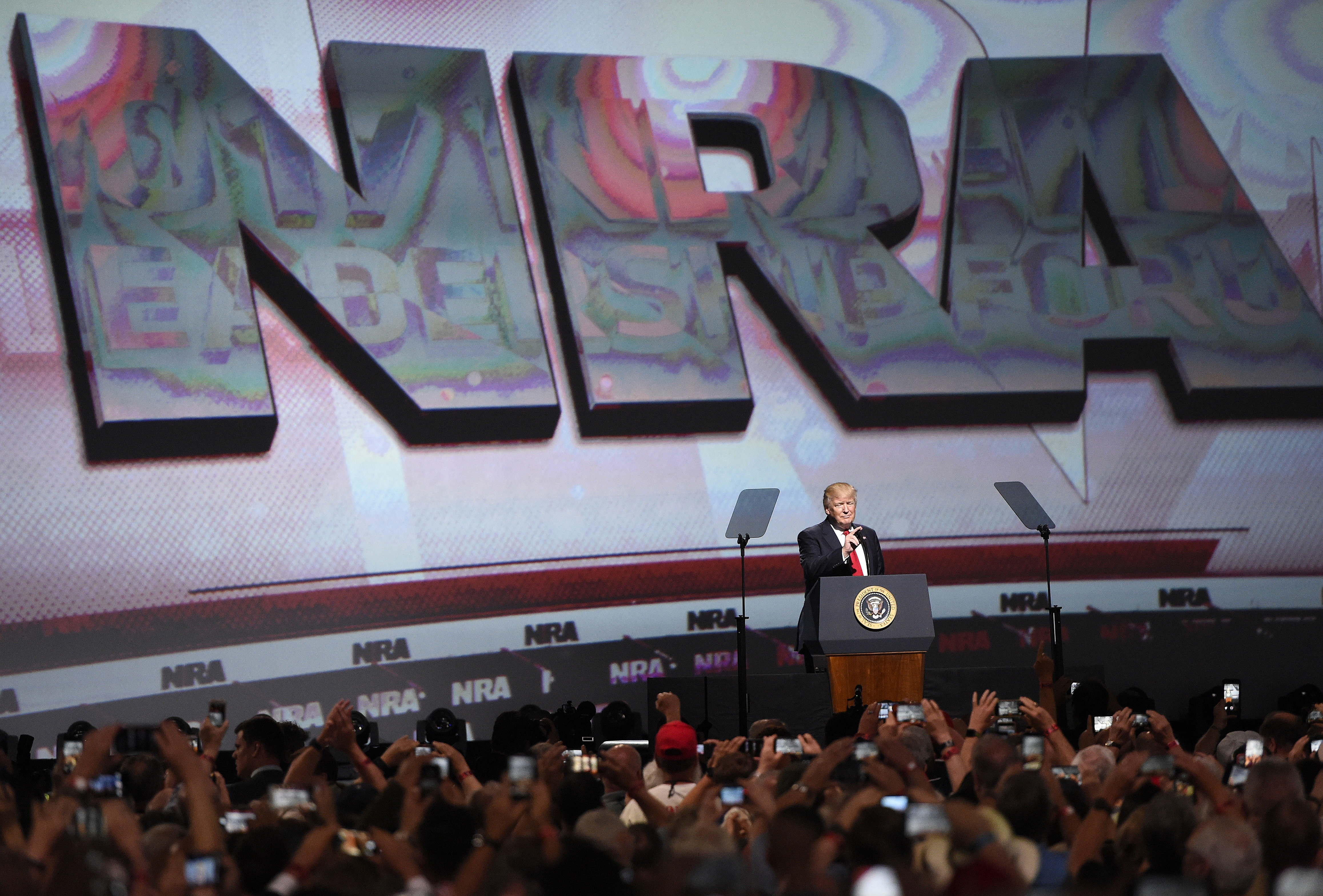 President Donald Trump speaks at the National Rifle Association-ILA Leadership Forum, Friday, April 28, 2017, in Atlanta. CREDIT: AP Photo/Mike Stewart
