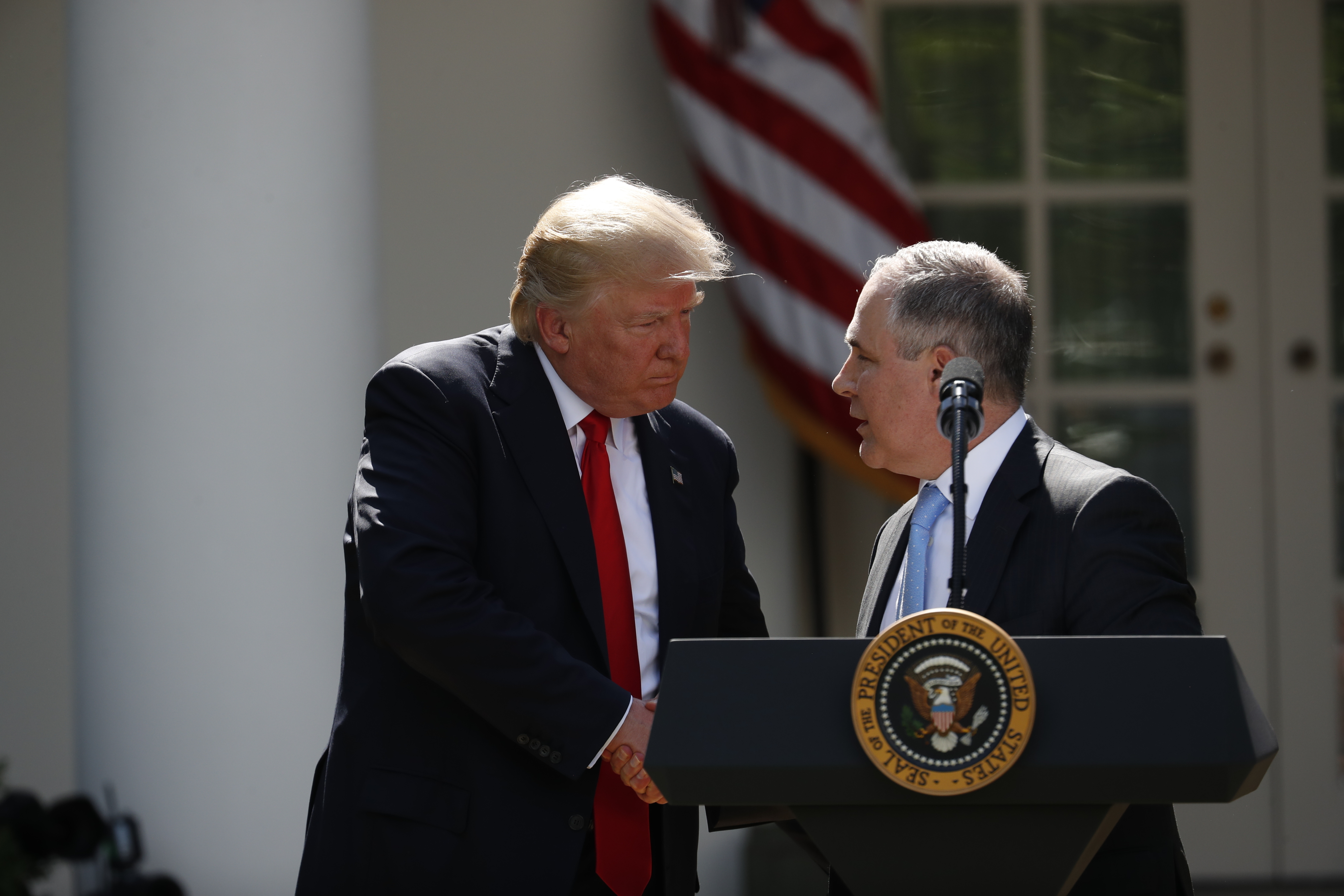 President Donald Trump shakes hands with EPA Administrator Scott Pruitt after speaking about the US role in the Paris climate change accord.(CREDIT: AP Photo/Pablo Martinez Monsivais)