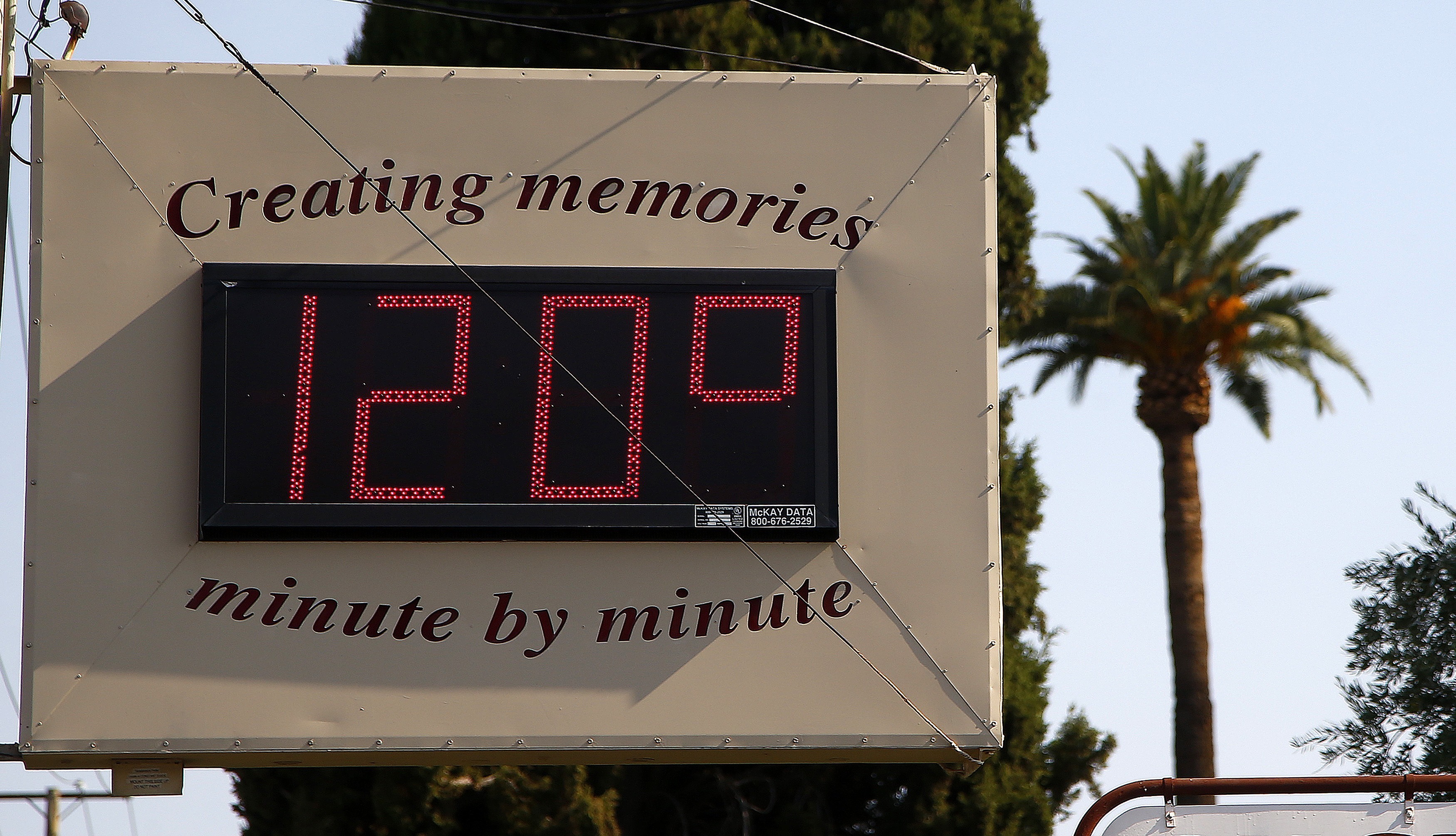 A local temperature sign reads 120-degrees in Phoenix, AZ. (CREDIT: AP Photo/Ross D. Franklin)