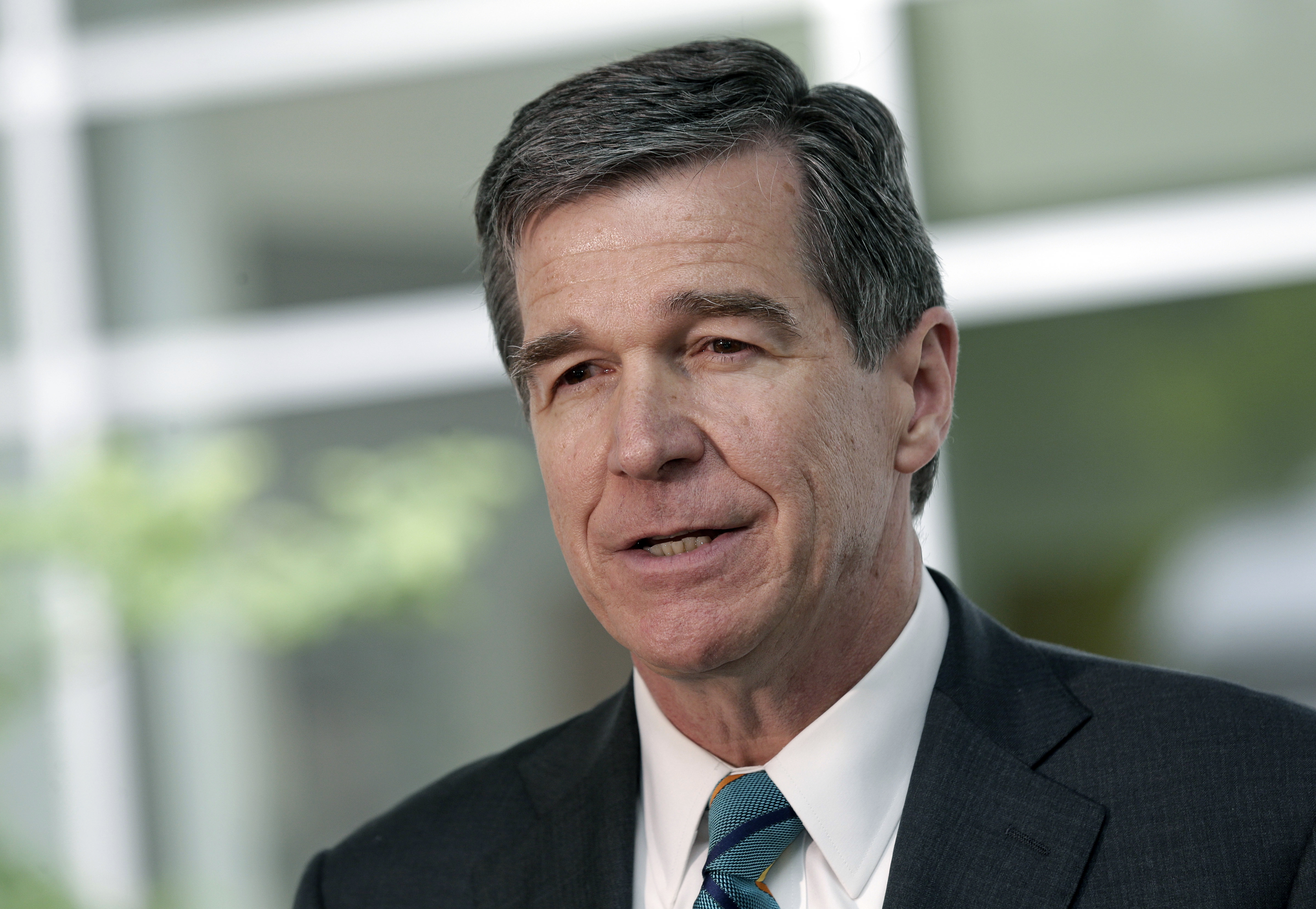 North Carolina Gov. Roy Cooper at a news conference in Morrisville, N.C. (CREDIT: AP Photo/Gerry Broome, File)