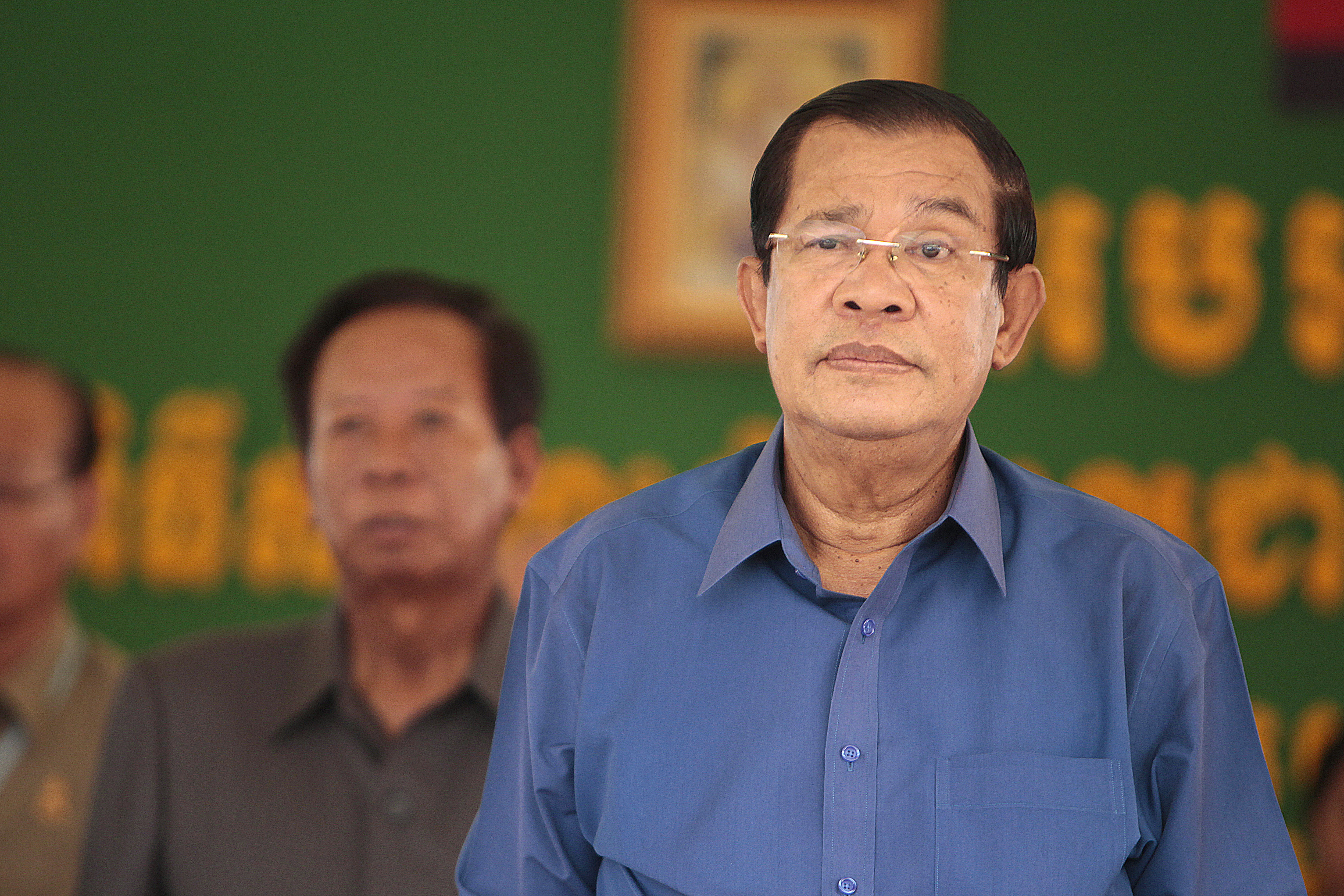 Cambodia's Prime Minister Hun Sen prepares to deliver a speech during a factory visit outside of Phnom Penh, Cambodia, Aug. 30, 2017. (CREDIT: AP Photo/Heng Sinith)
