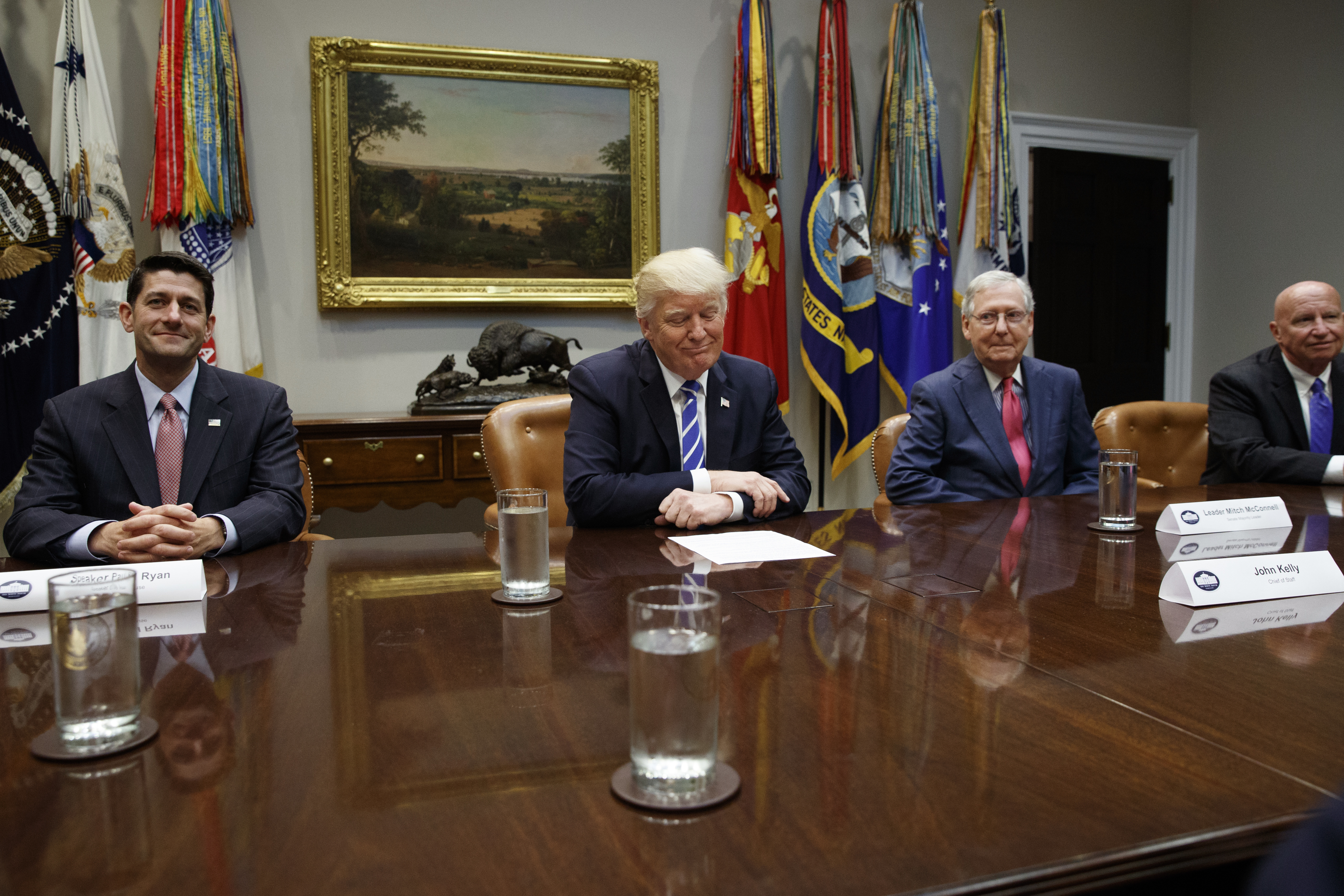 President Donald Trump pauses during a meeting with Congressional leaders and administration officials on tax reform, in the Roosevelt Room of the White House, Tuesday, Sept. 5, 2017, in Washington. From left, House Speaker Paul Ryan, R-Wis., Trump, Senate Majority Leader Mitch McConnell, R-Ky., and Rep. Kevin Brady, R-Texas. (AP Photo/Evan Vucci)