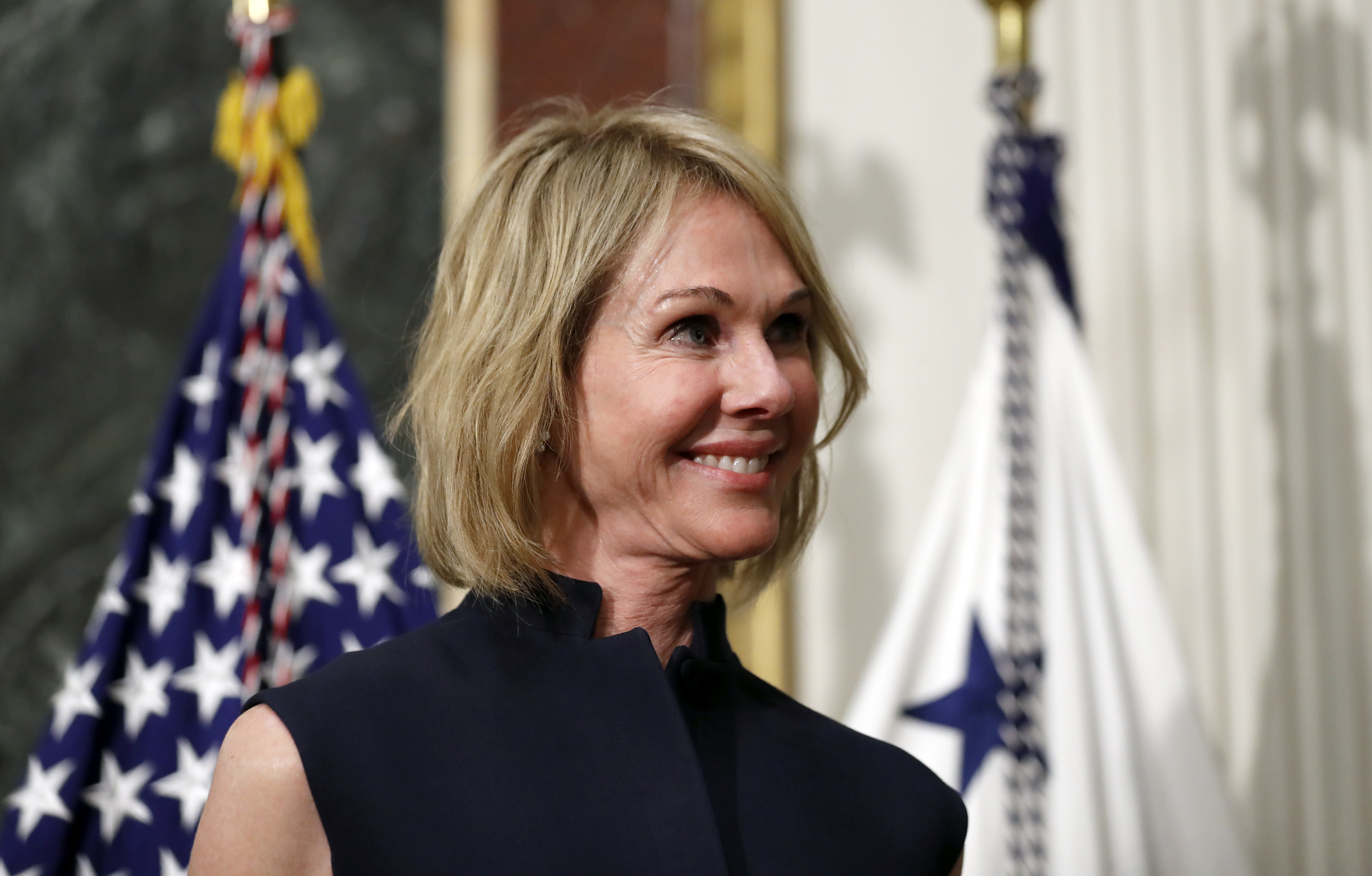 U.S. Ambassador to Canada Kelly Knight Craft stands during her swearing in ceremony in the Indian Treaty Room in the Eisenhower Executive Office Building on the White House grounds, Tuesday, Sept. 26, 2017, in Washington. CREDIT: (AP Photo/Alex Brandon