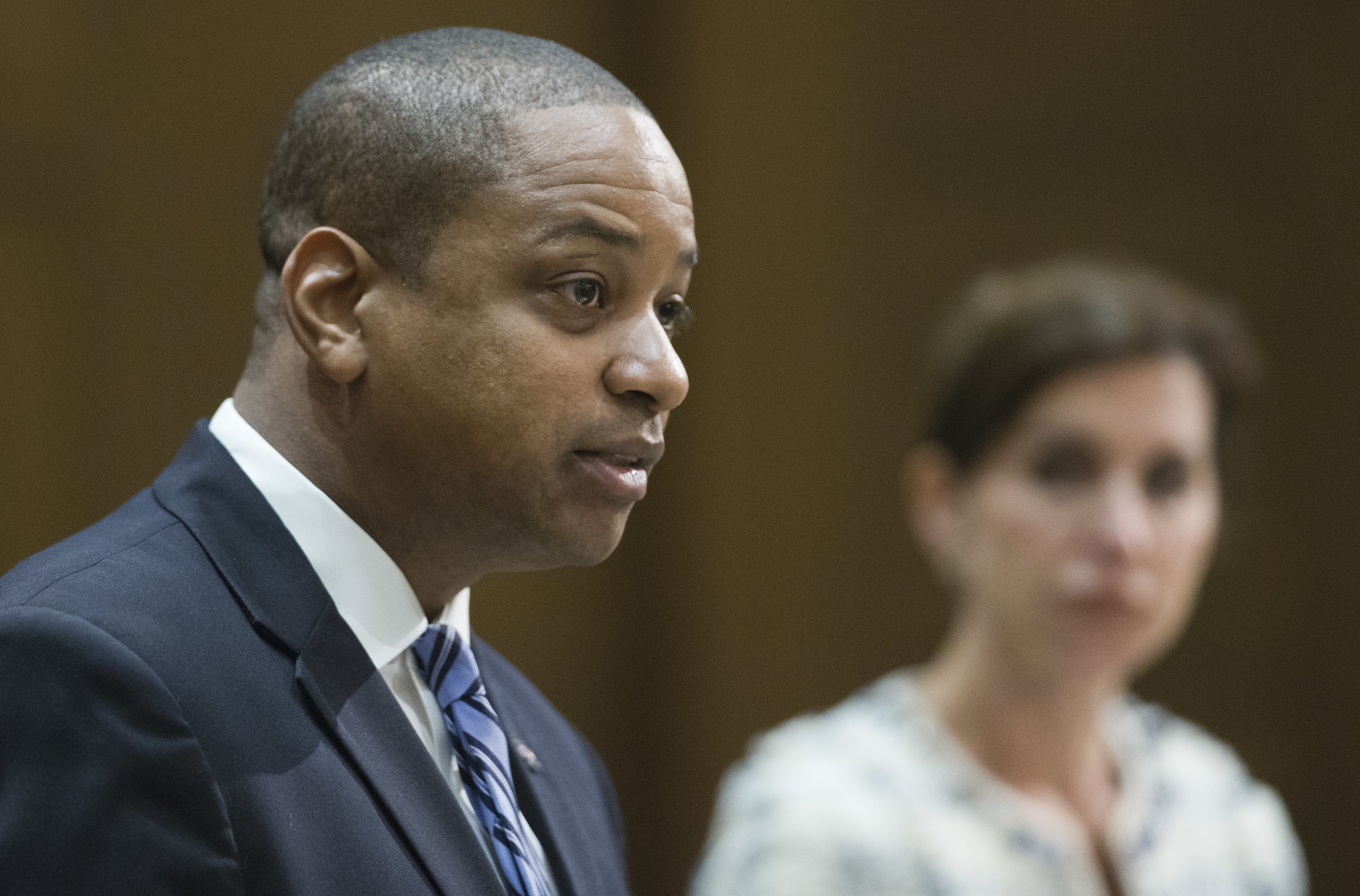 Democrat candidate for Lt. Gov. Justin Fairfax, left, speaks during a debate against Republican Virginia State Sen. Jill Vogel. (AP Photo/Steve Helber)