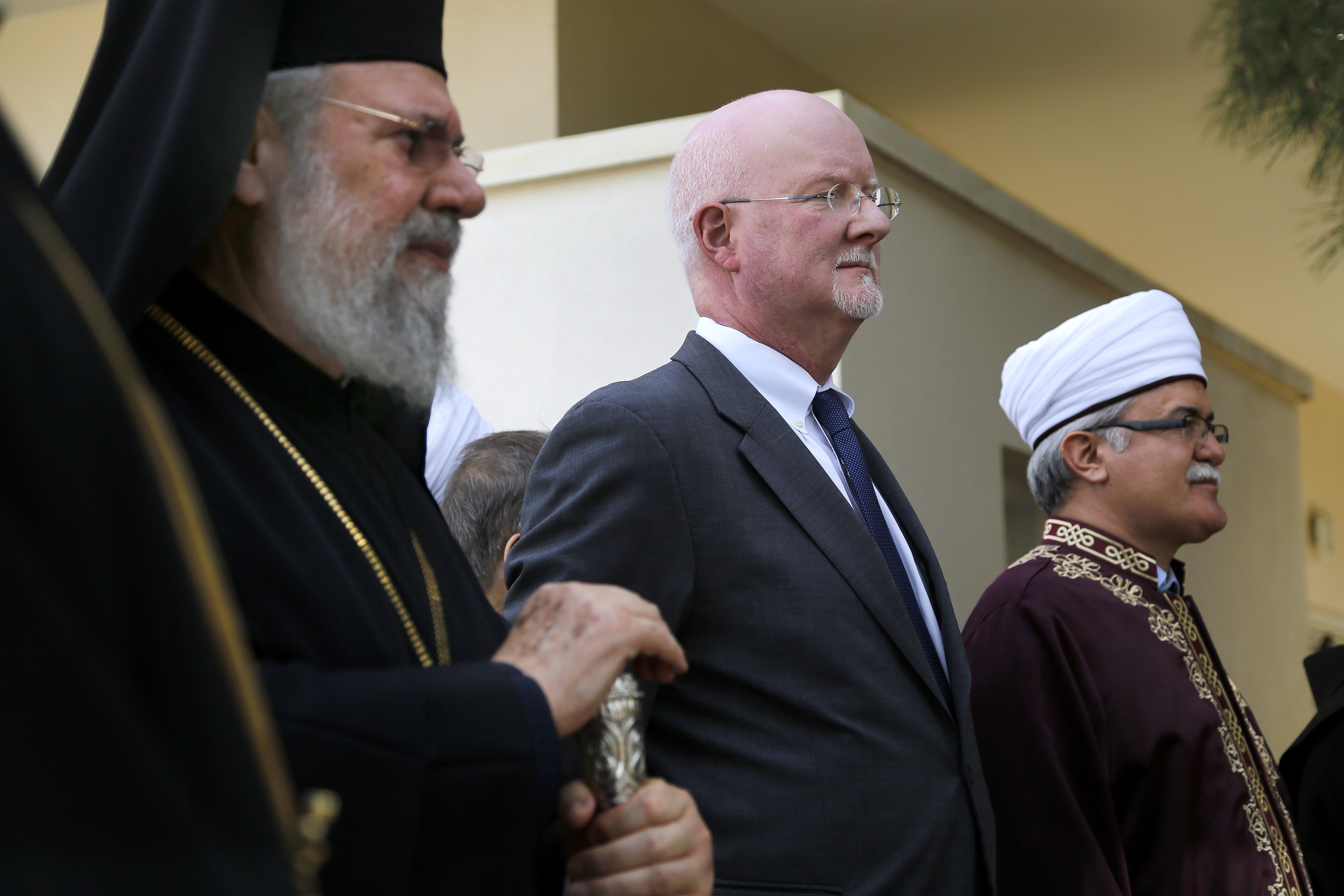 Shaun Casey, U.S. State Department Special Representative for Religion and Global Affairs under Barack Obama, center, stands with the Greek Orthodox Christian Archbishop Chrysostomos, left, and Muslim Grand Mufti Talip Atalay, right, in March 2016. CREDIT: AP Photo/Petros Karadjias