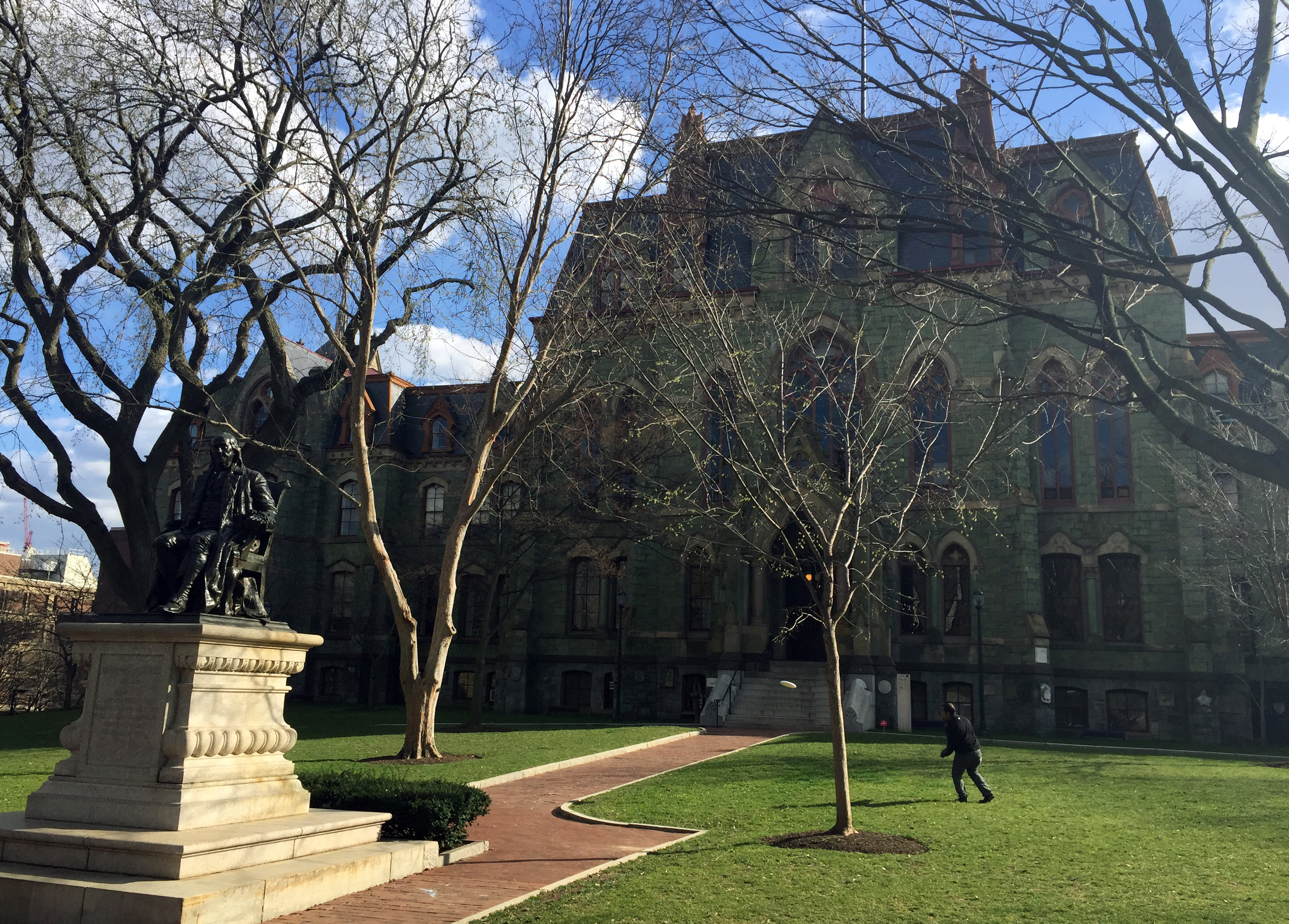 People walk in and out of The Wharton School building on the University of Pennsylvania campus in Philadelphia. Donald Trump frequently mentions that he is an alumnus of the school, which is one of the top business schools in the country. He graduated in 1968 with a bachelors degree. But Trumps relationship with his alma mater is complicated. (AP Photo/Beth J. Harpaz)