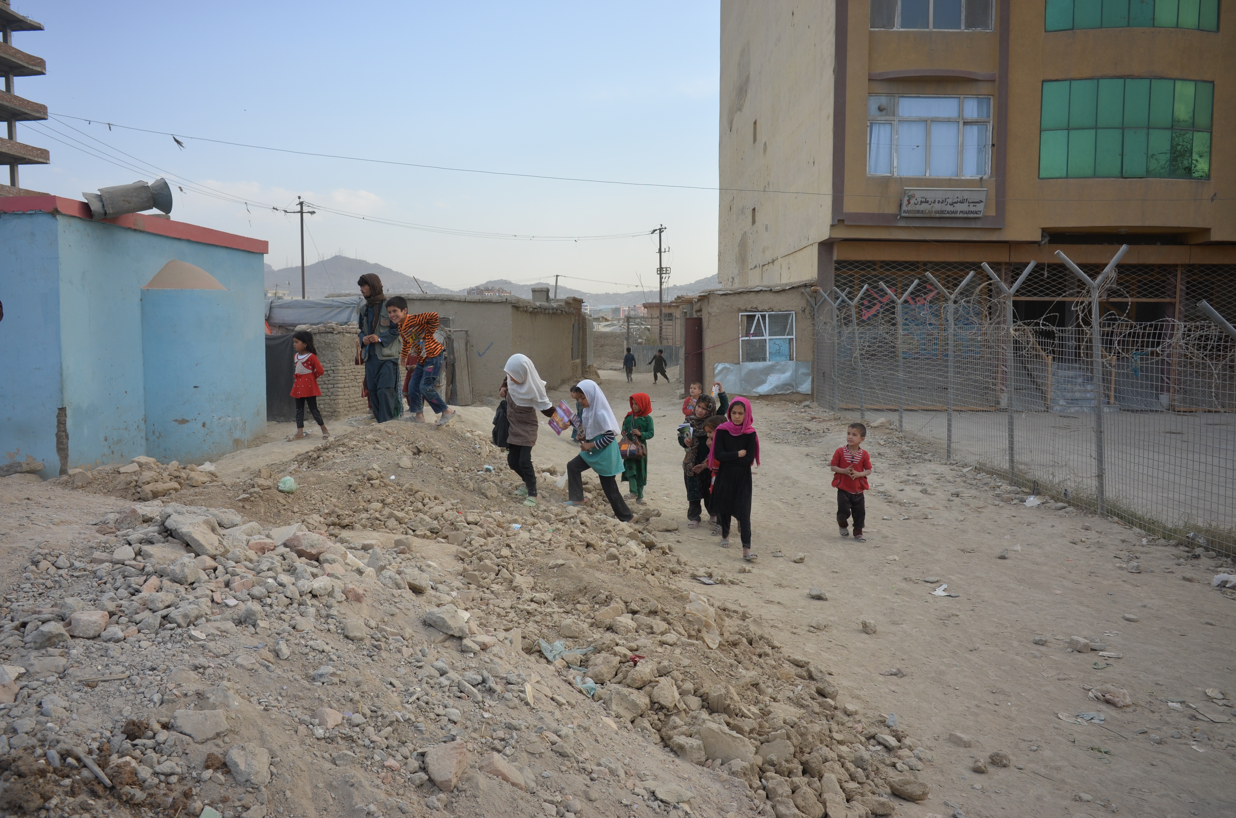 The Chaman-e Babrak IDP camp in Kabul is home to 750 internally displaced families, who say their children often face discrimination in schools for coming from poor areas and for lacking proper, clean uniforms and school supplies. (CREDIT: ALI M. LATIFI)