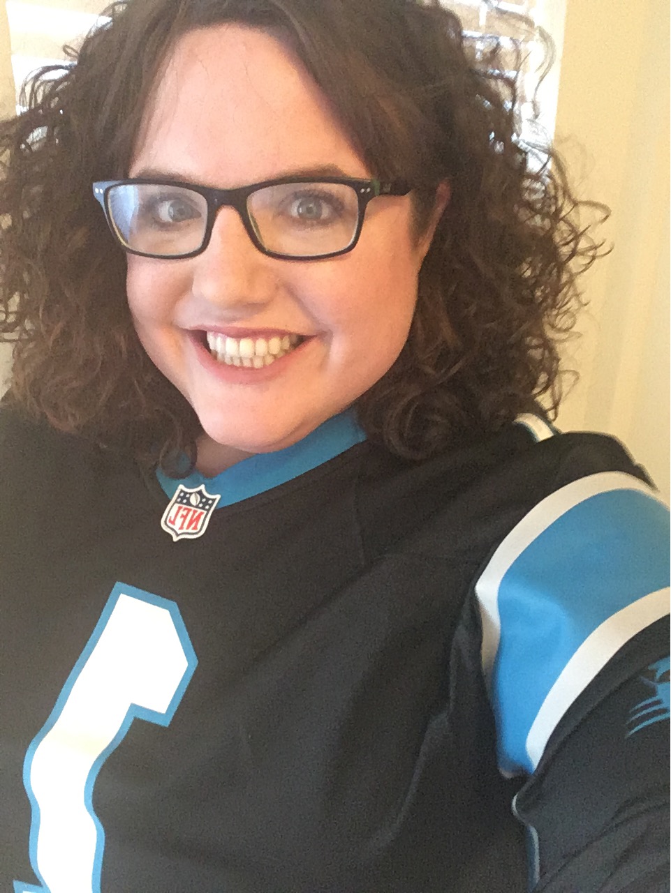 The writer in her Cam Newton jersey.
