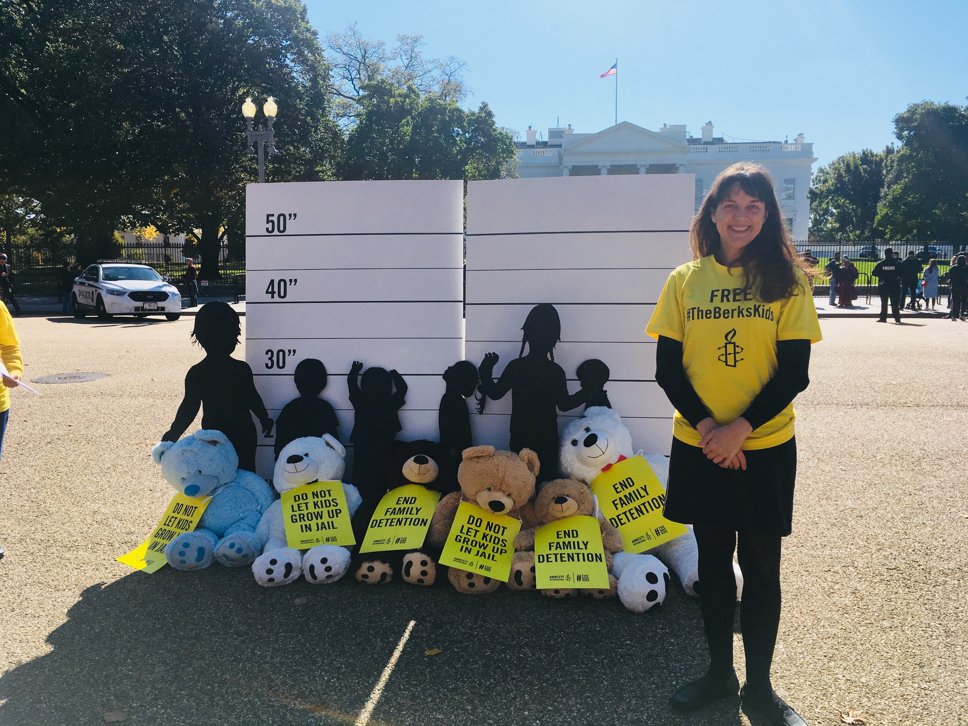Denise Bell, Senior Campaigner for Refugee and Migrant Rights at Amnesty International USA, outside the White House on October 30, 2017 to bring attention to the plight of detained immigrant children. (CREDIT: Esther Y. Lee)