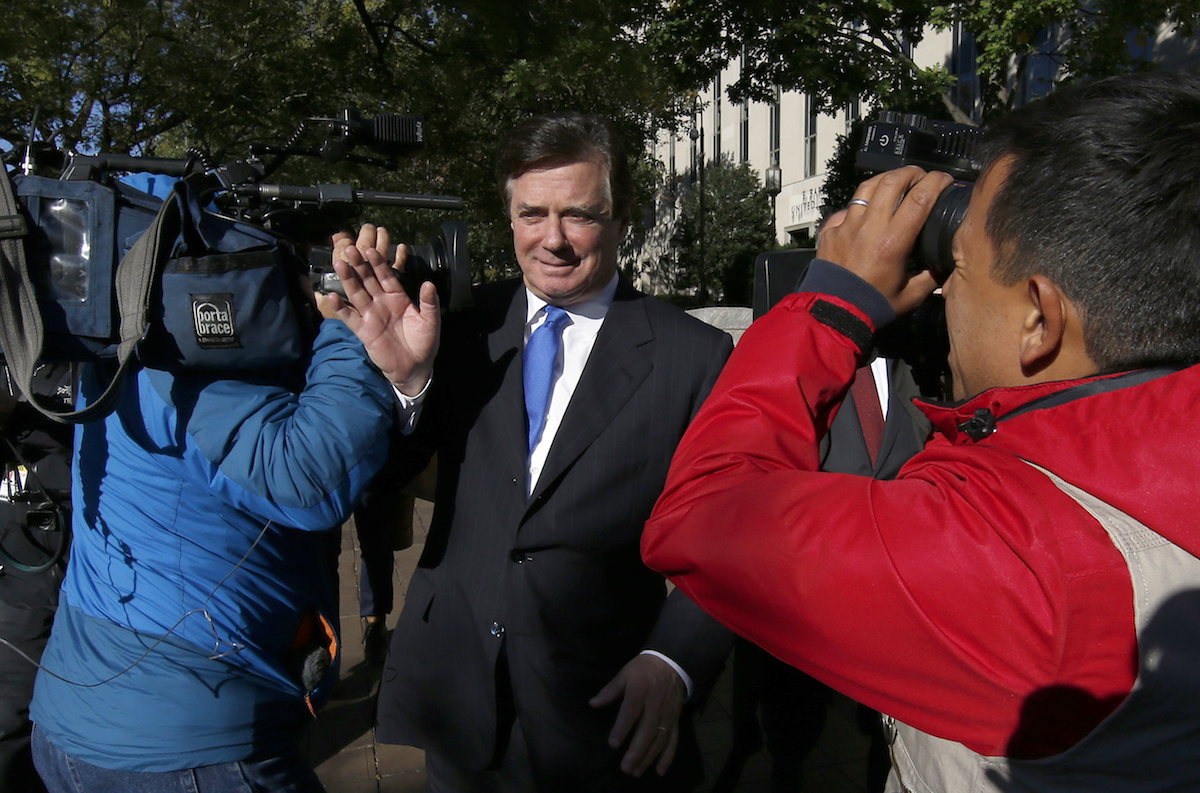 Paul Manafort, President Donald Trump's former campaign chairman, departs at Federal District Court in Washington, Monday, Oct. 30, 2017. Manafort, and a former business associate, Rick Gates, have been told to surrender to federal authorities Monday, according to reports and a person familiar with the matter. (AP Photo/Alex Brandon)