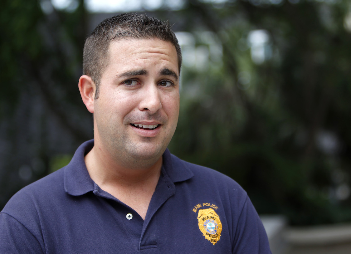 Sgt. Javier Ortiz, vice president of the Miami Fraternal Order of Police, speaks during an interview with The Associated Press, May 29, 2012 in Miami. (CREDIT: AP/Wilfredo Lee)