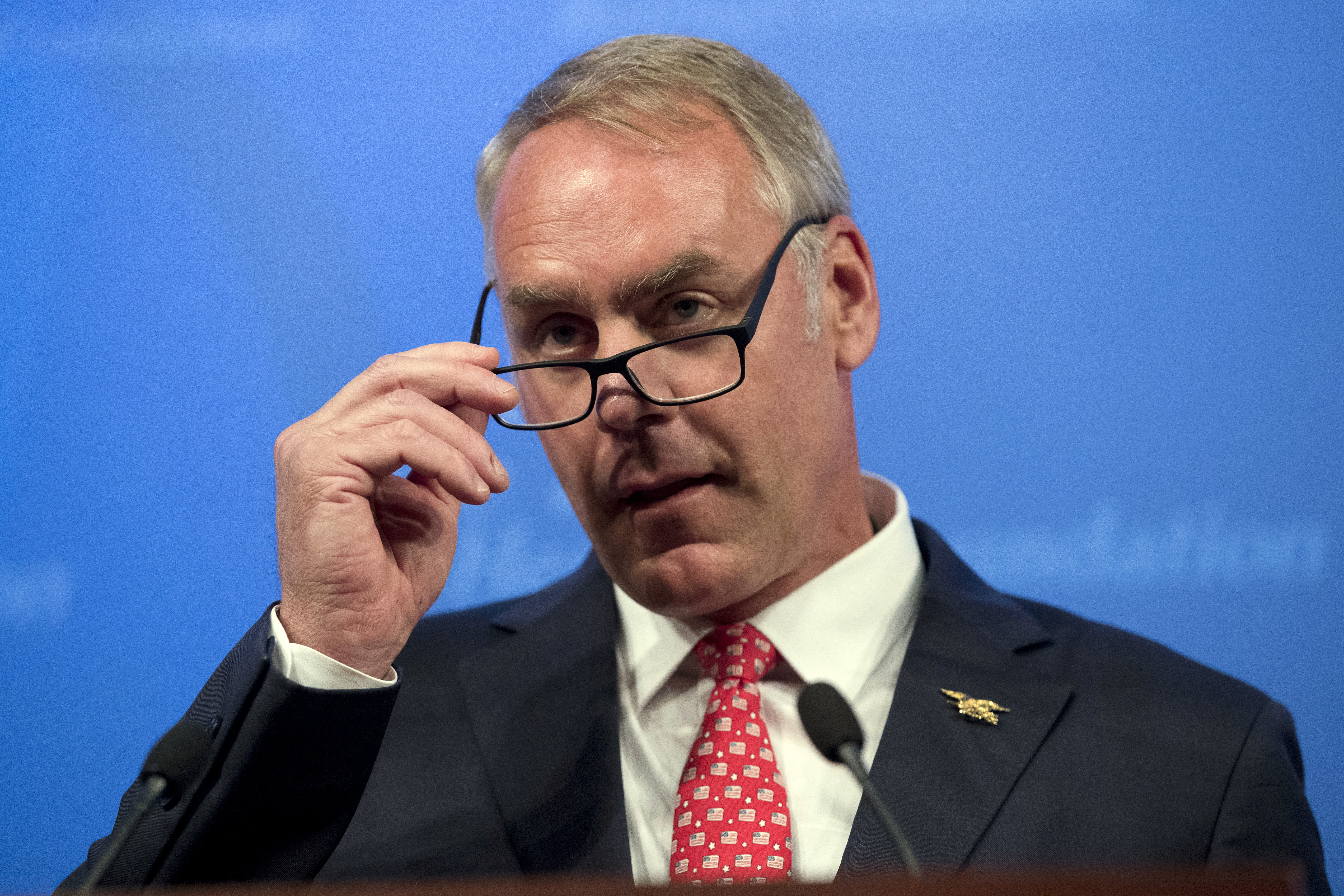 Interior Secretary Ryan Zinke, speaking at the Heritage Foundation on September 29, 2017, defended his use of chartered flights. CREDIT: AP Photo/Andrew Harnik