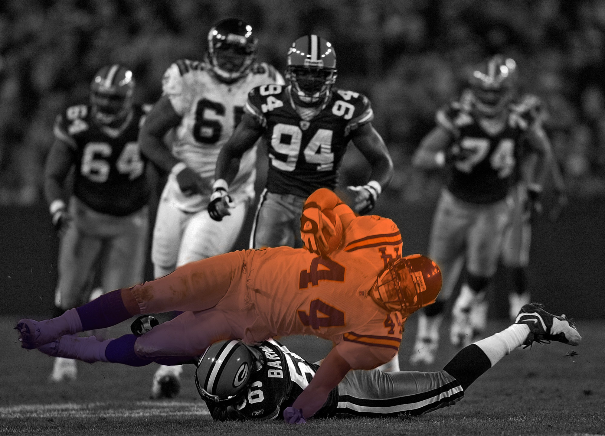 Green Bay Packers linebacker Nick Barnet (56) tackles Minnesota Vikings tight end Sean Berton after a nine-yard reception in the third quarter Sunday, Nov. 14, 2004, in Green Bay, Wis. The Packers won 34-31. CREDIT: AP Photo/Morry Gash; ThinkProgress/Diana Ofosu