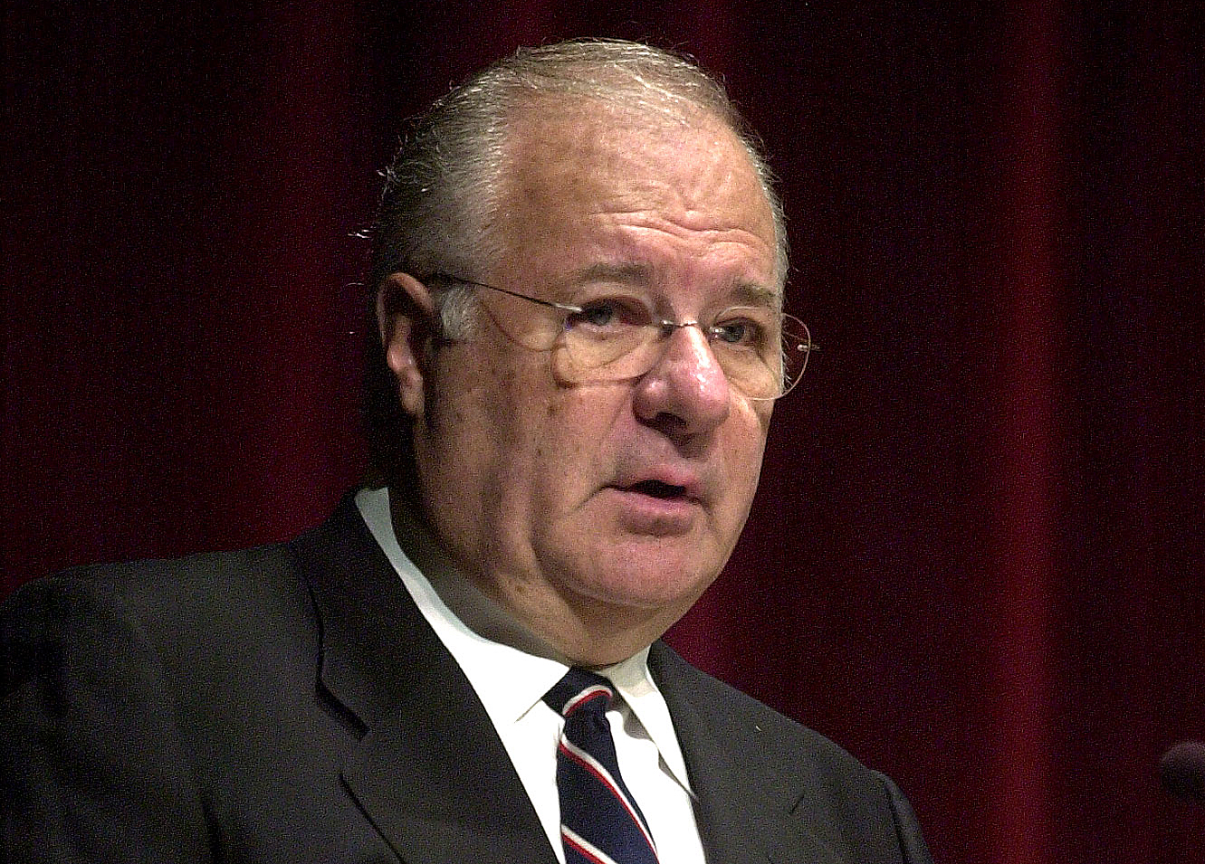In this Feb. 16, 2005 file photo, Ameritrade chairman and founder Joe Ricketts talks to shareholders in Omaha, Neb. CREDIT: AP Photo/Dave Weaver, File