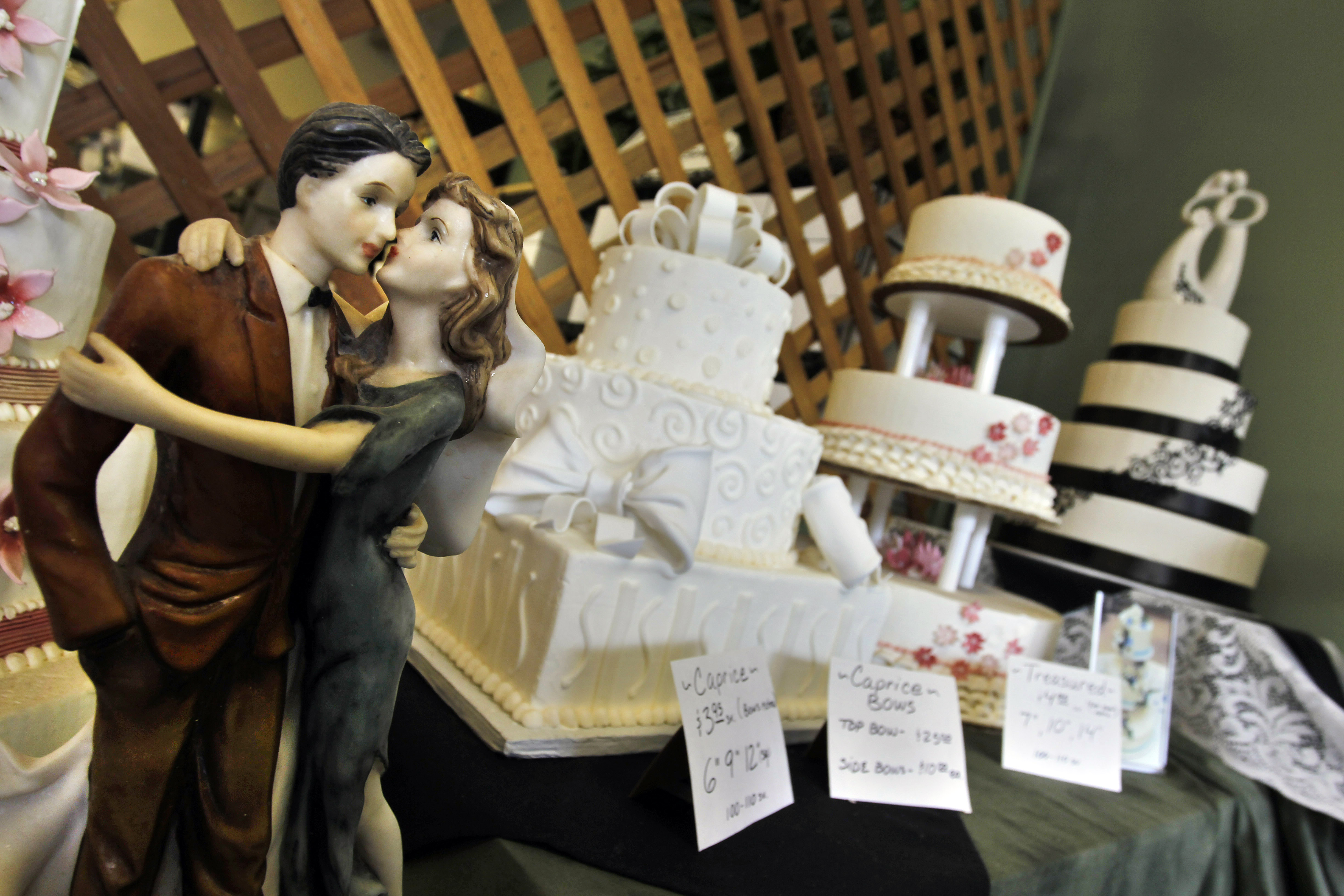 A 2013 photo showing wedding cakes on display in Masterpiece Cakeshop. CREDIT: AP Photo/Brennan Linsley