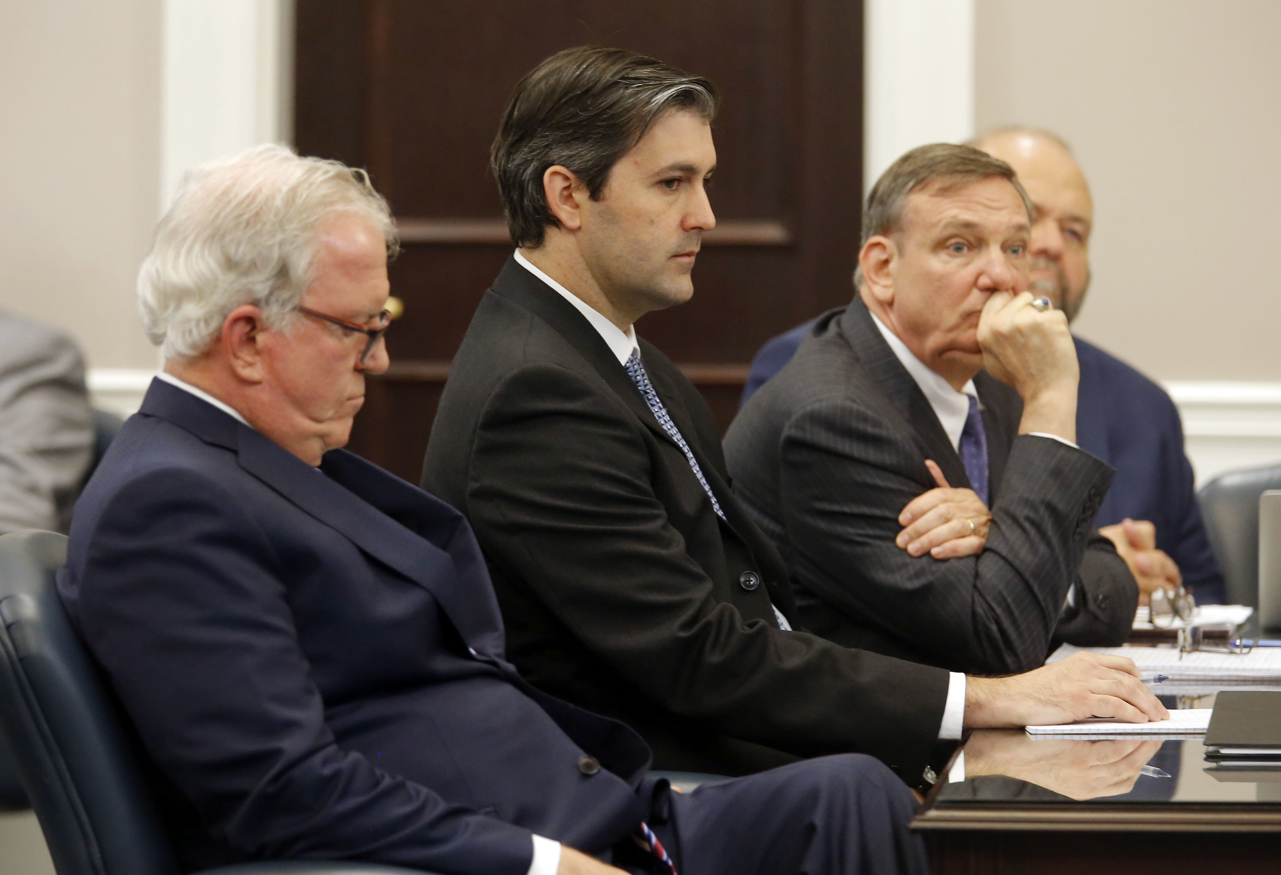 Former cop Michael Slager, center, flanked by his attorneys. CREDIT: Grace Beahm/Post and Courier via AP, Pool