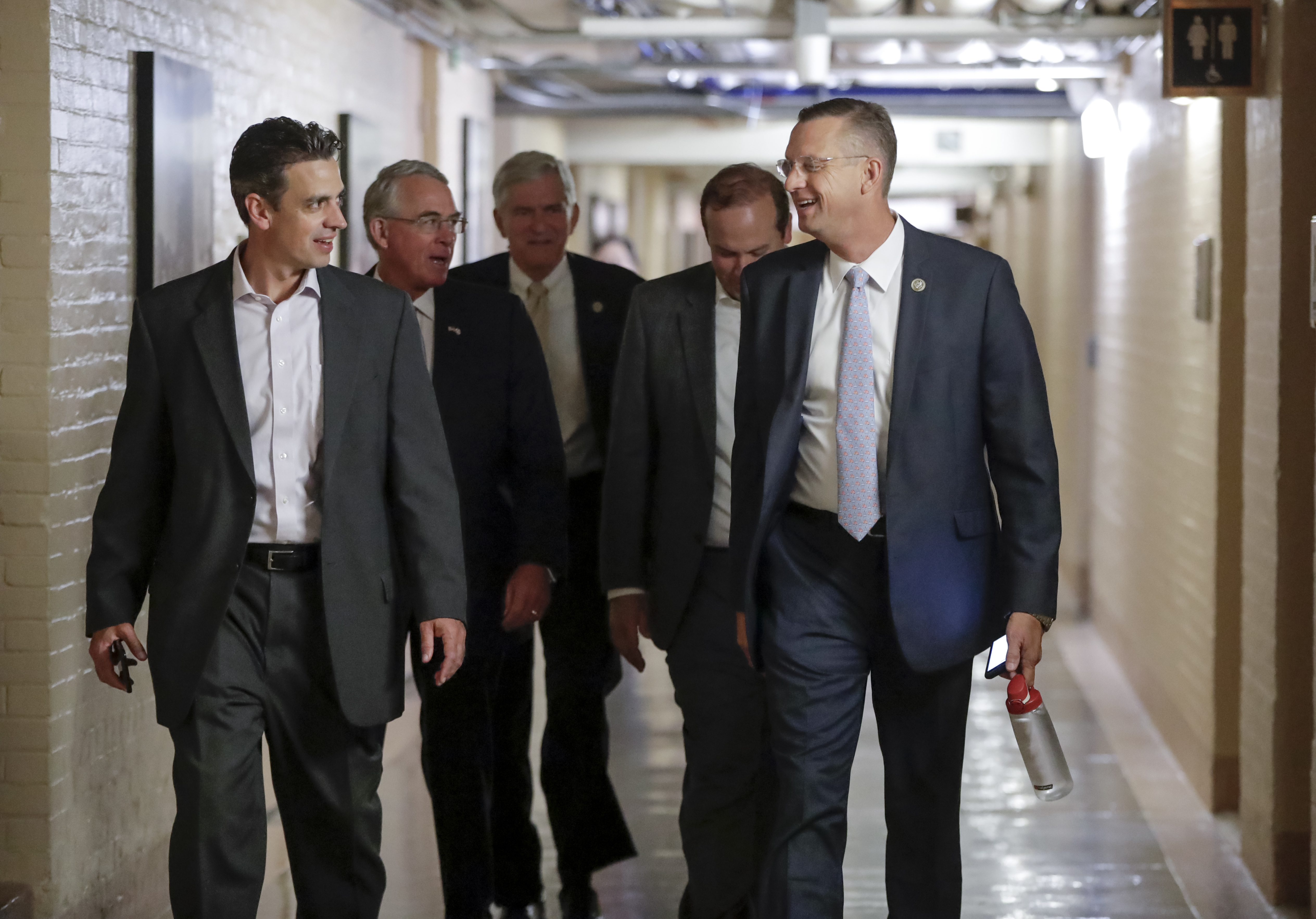 Rep. Tom Graves, R-Ga., far left, and Rep. Doug Collins, R-Ga., far right, head to a meeting with fellow Republicans on Capitol Hill in Washington (CREDIT: AP Photo/J. Scott Applewhite)