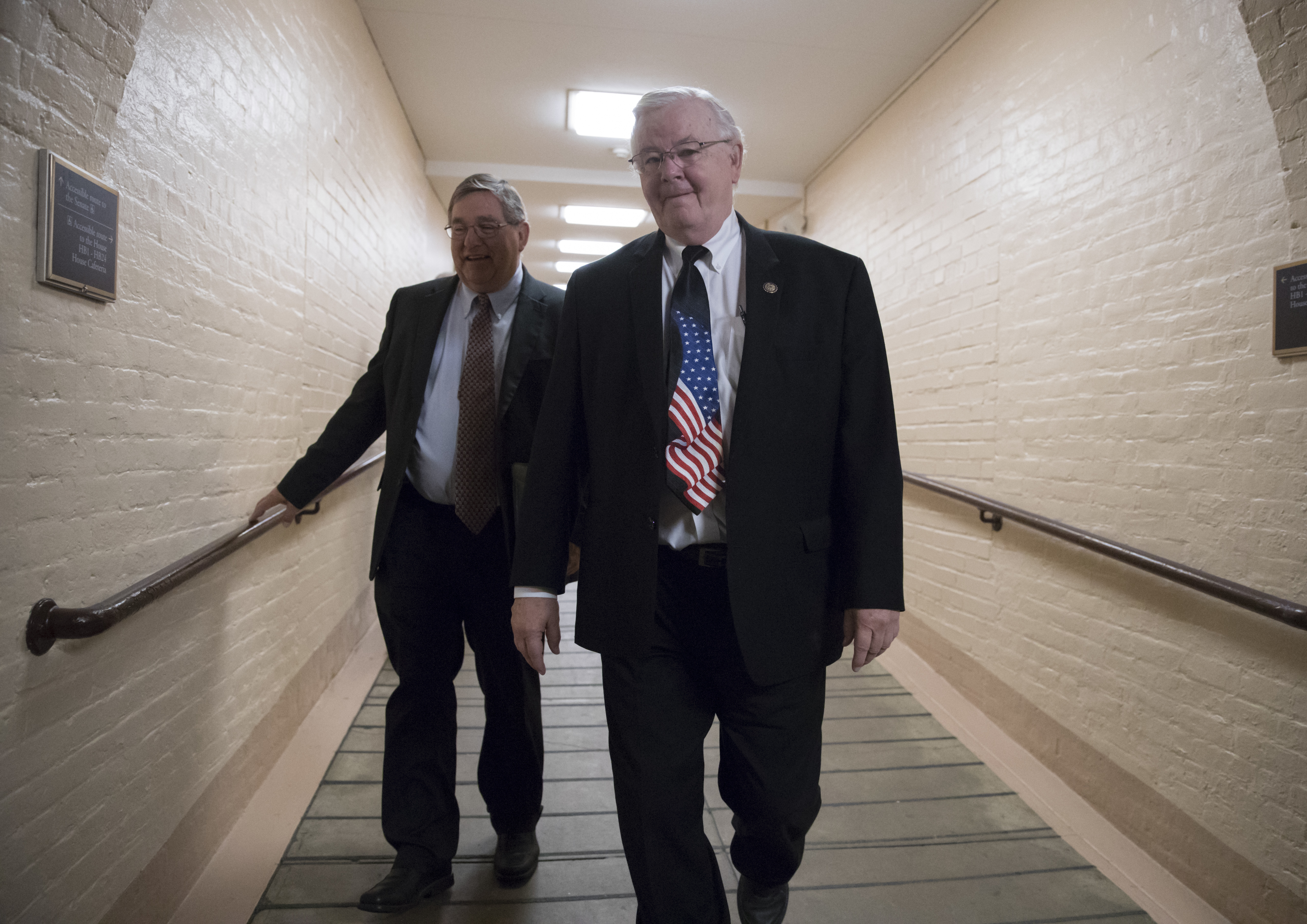 Rep. Michael C. Burgess (R-TX), left, with Rep. Joe Barton (R-TX), right. Barton has decided to retire following a leaked nude photo scandal. (CREDIT: AP Photo/J. Scott Applewhite)