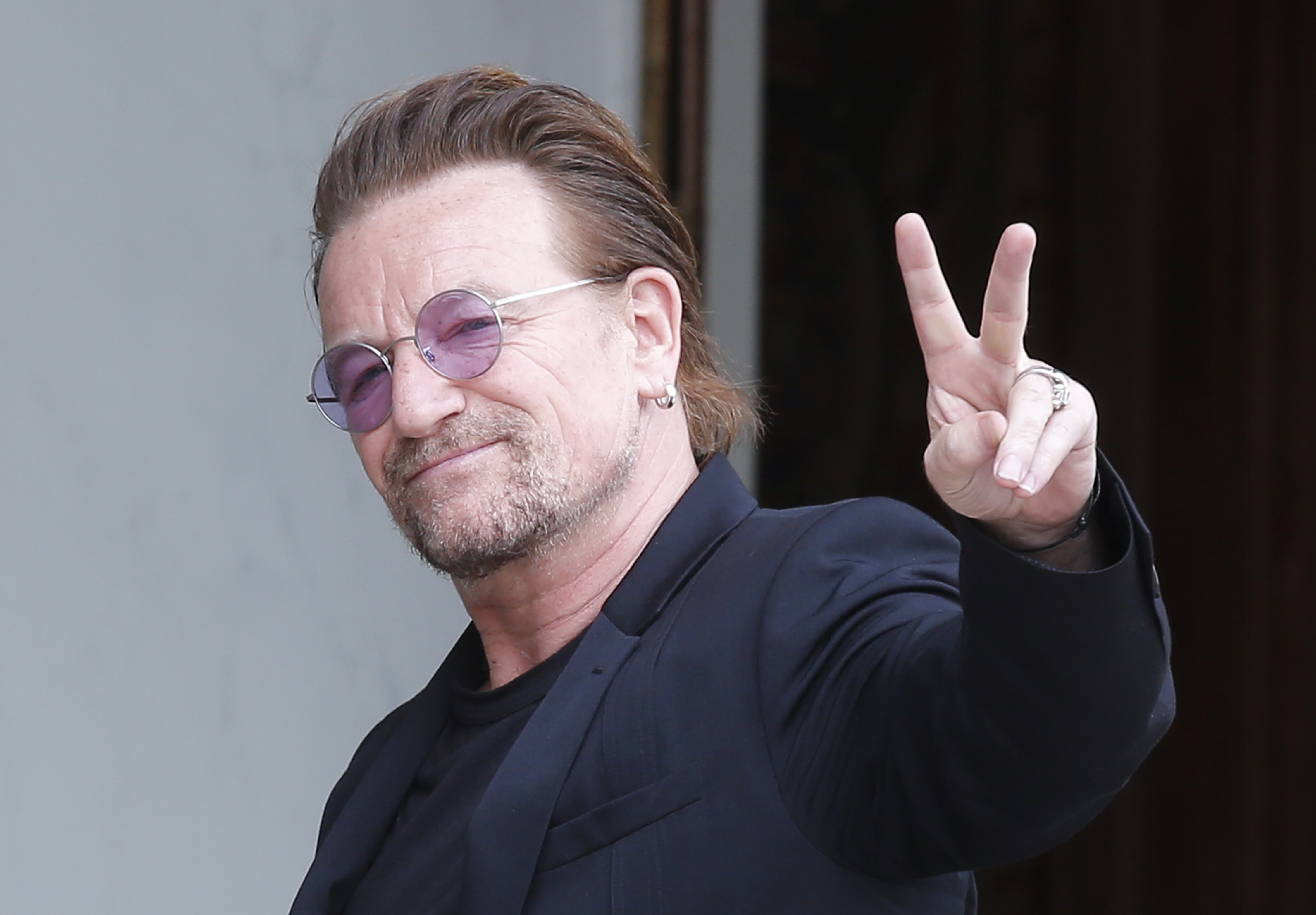 U2 singer Bono is one of several widely renowned philanthropists who show up in the same trove of leaked documents on confidential offshore dealings as members of President Donald Trump's inner circle. CREDIT: AP Photo/Michel Euler, file