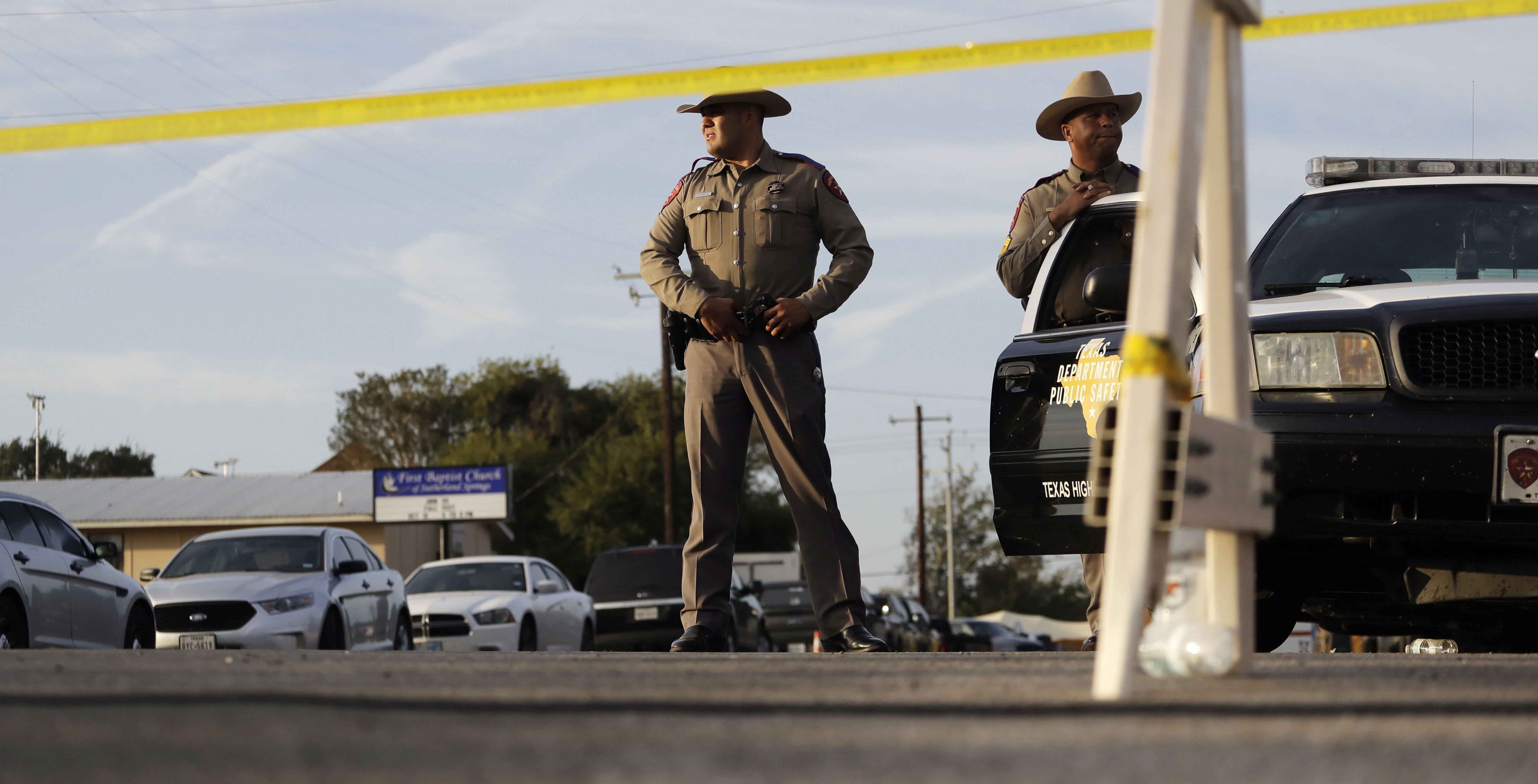Law enforcement officials work the scene of a shooting at the First Baptist Church of Sutherland Springs, Monday, Nov. 6, 2017, in Sutherland Springs, Texas. CREDIT: AP Photo/Eric Gay