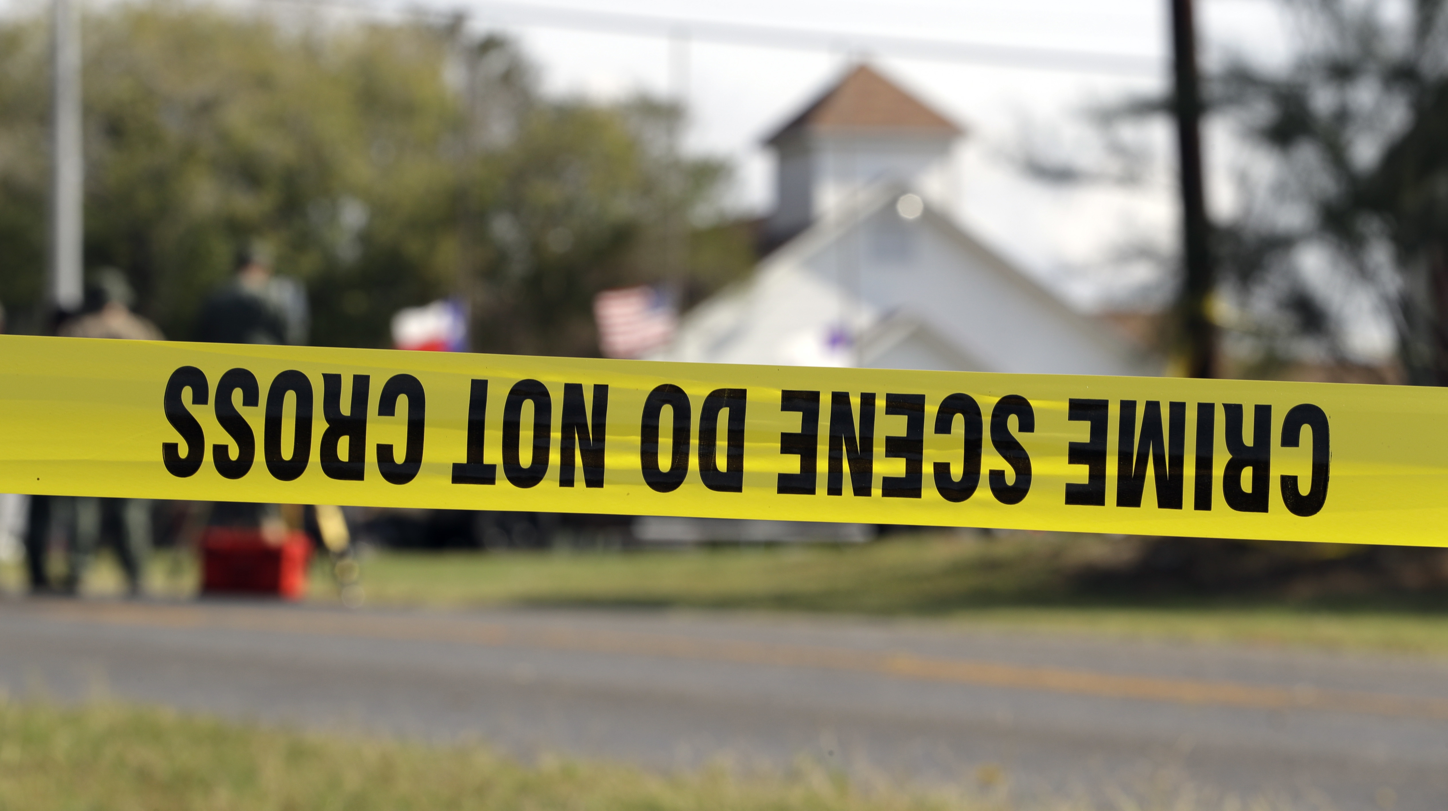Law enforcement officials continue to investigate the scene of a shooting at the First Baptist Church of Sutherland Springs, Tuesday, Nov. 7, 2017, in Sutherland Springs, Texas. CREDIT: AP Photo/Eric Gay