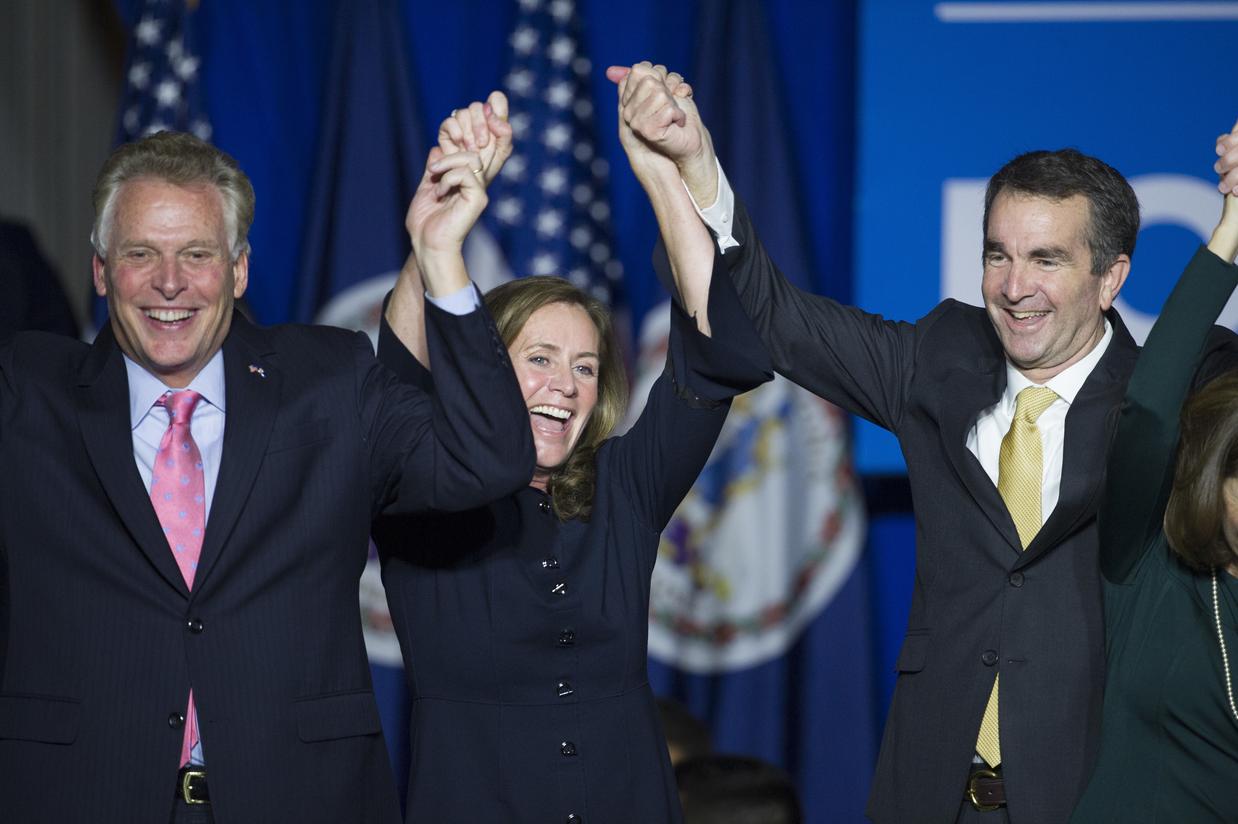 Ralph Northam (right) celebrates his electoral victory with governor Terry McAuliffe. (AP Photo/Cliff Owen)