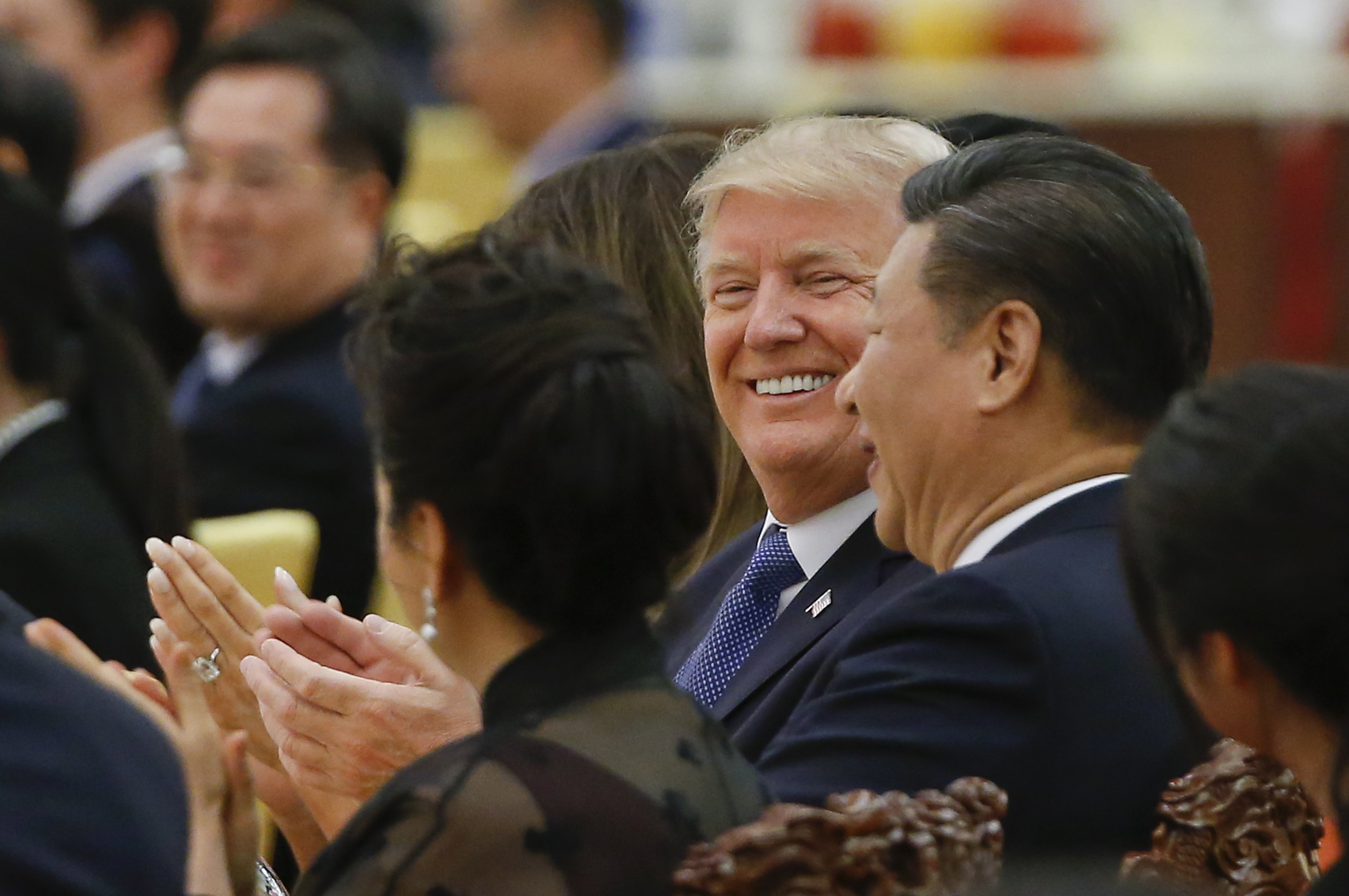 U.S. President Donald Trump and China's President Xi Jinping attend at a state dinner at the Great Hall of the People in Beijing, China, Thursday, Nov. 9, 2017. CREDIT: Thomas Peter/Pool Photo via AP