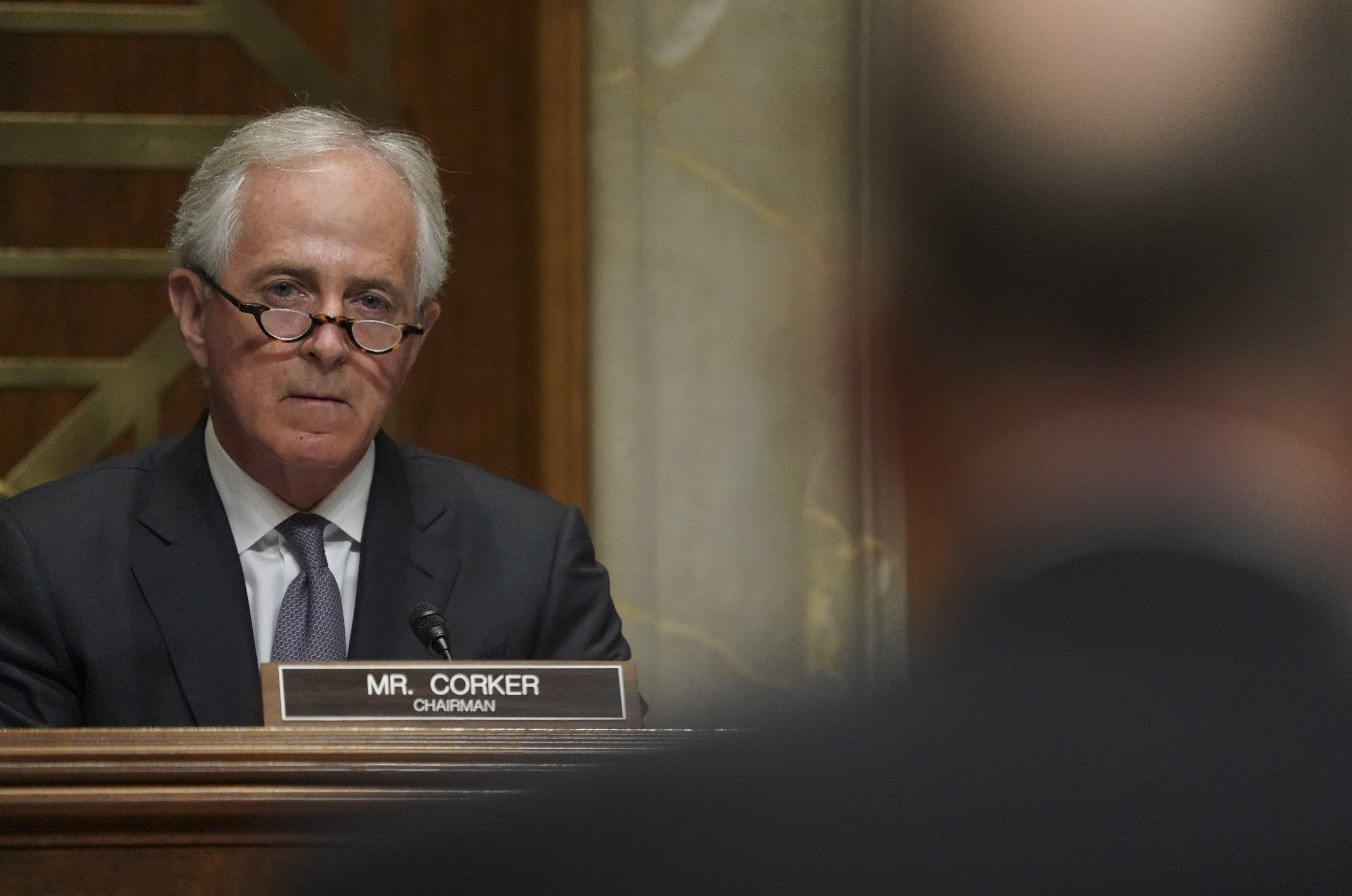 Chairman Sen. Bob Corker, R-Tenn., left, listens to General C. Robert Kehler, right, USAF (Ret.) former Commander United States Strategic Command, during a Senate Foreign Relations Committee hearing on North Korea on Capitol Hill in Washington. CREDIT: Pablo Martinez Monsivais/AP Photo.