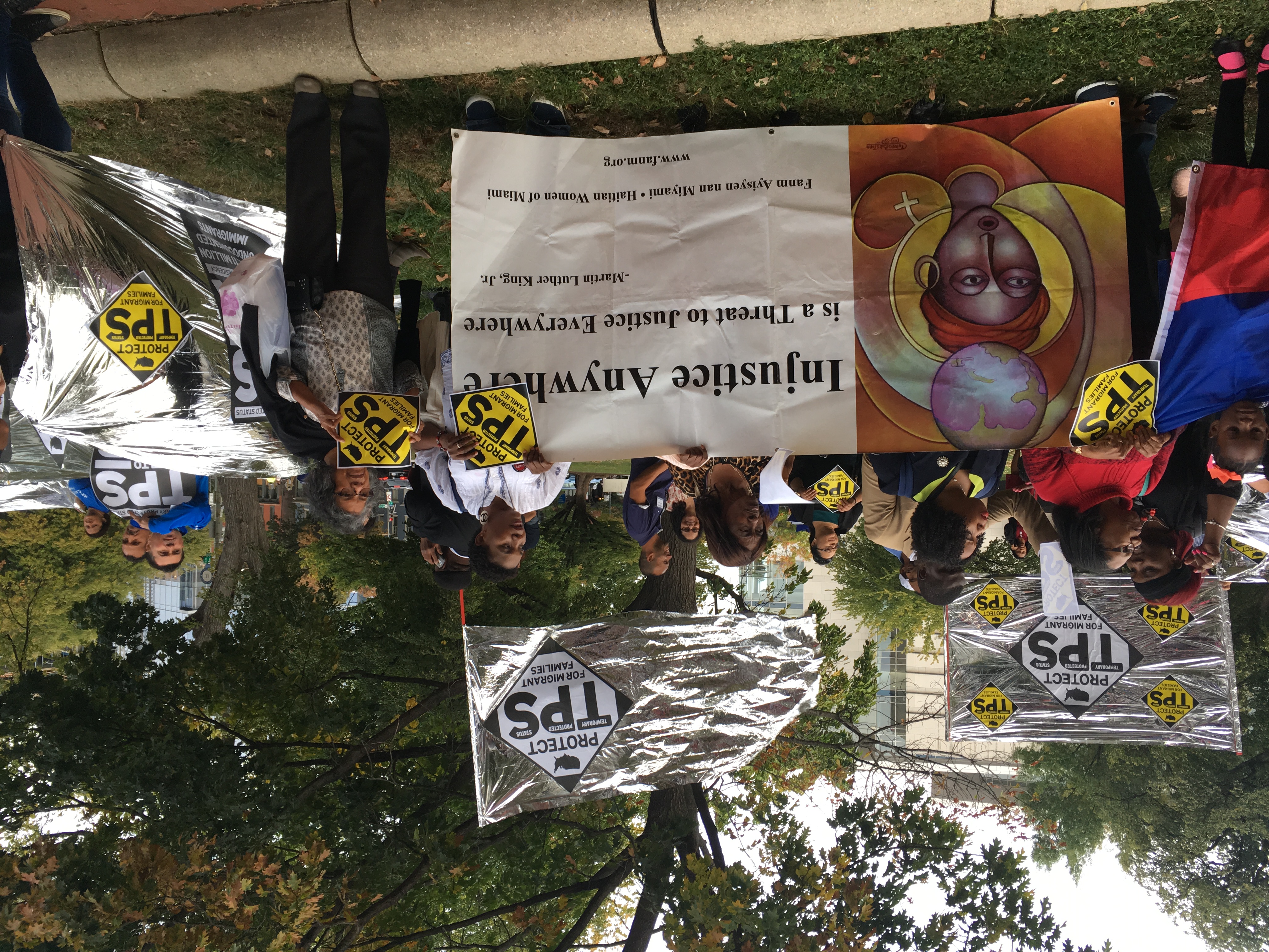 Organizers call on the Trump administration to protect the Temporary Protected Status (TPS) program. (CREDIT: Esther Y. Lee)