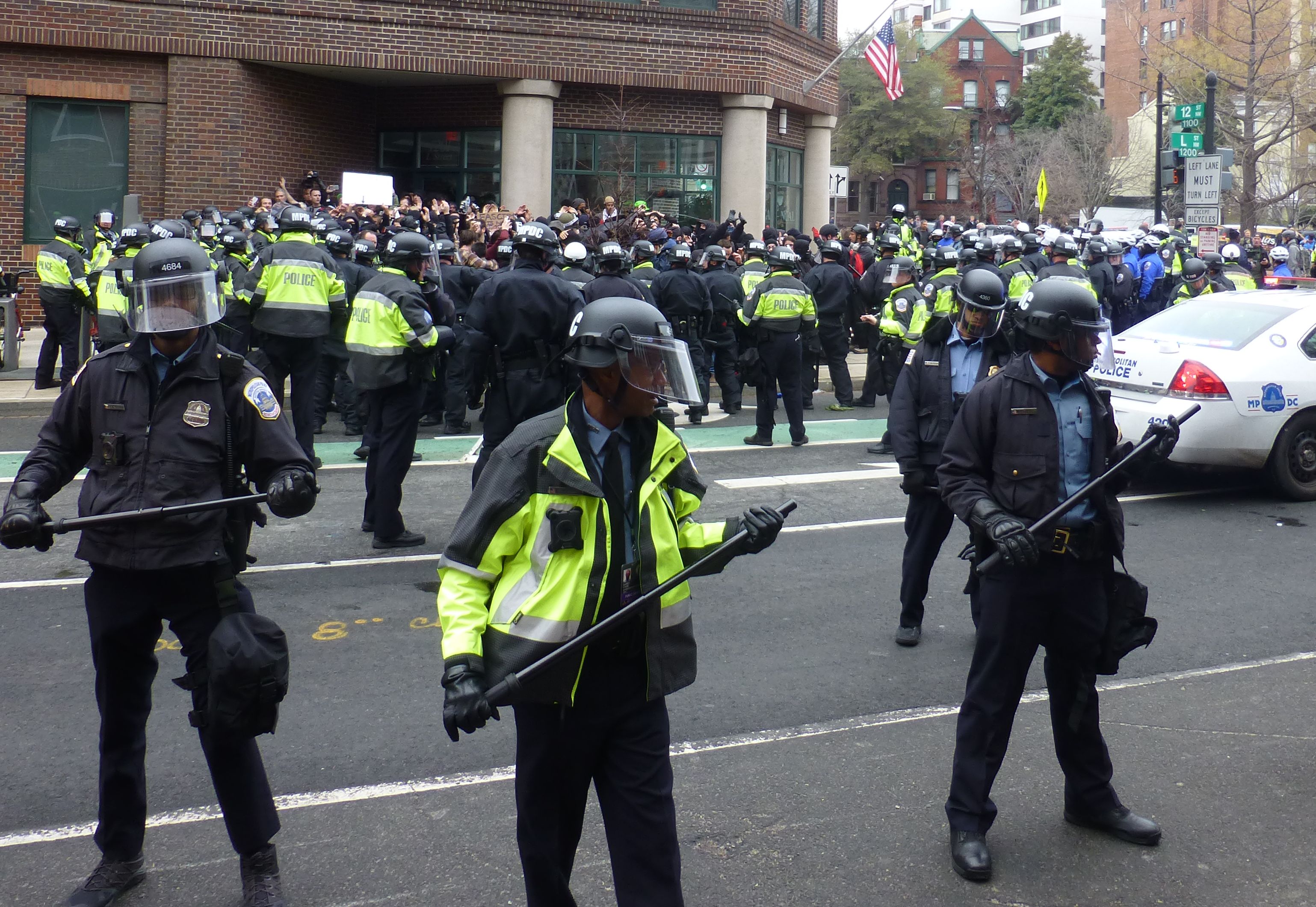 Police surround a large group of people protesting the inauguration of Donald Trump in downtown Washington on January 20, 2017. CREDIT: ThinkProgress/Mark Hand