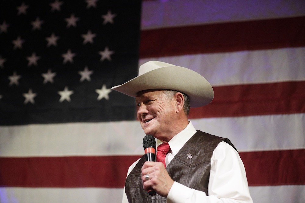 U.S. Senate candidate Roy Moore speaks at a rally, Monday, Sept. 25, 2017, in Fairhope, Ala. (AP Photo/Brynn Anderson)