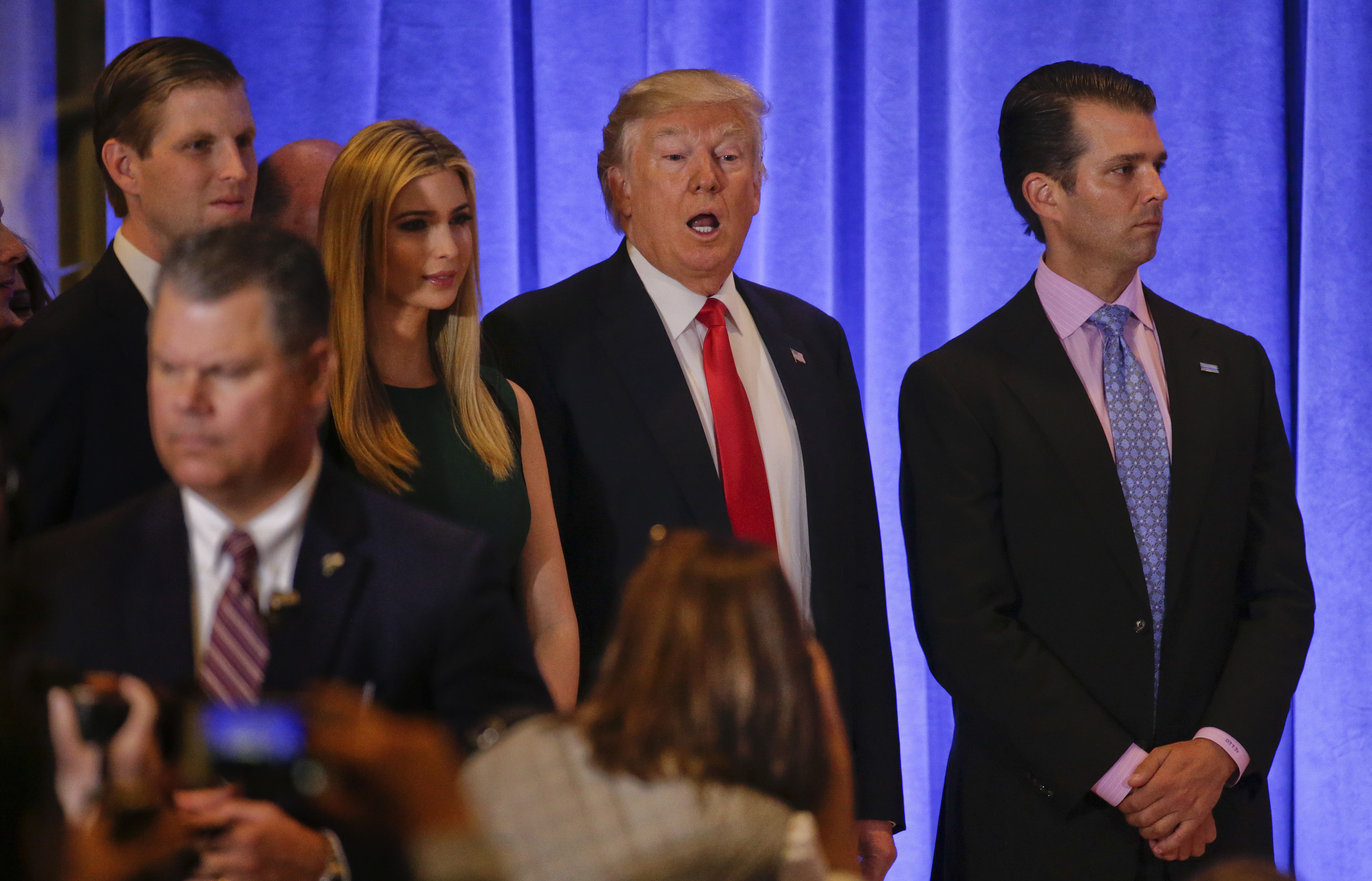 President-elect Donald Trump arrives for a news conference with family members Eric Trump, far left, Ivanka Trump, and Donald Trump Jr., Wednesday, Jan. 11, 2017, in New York. CREDIT: AP Photo/Seth Wenig