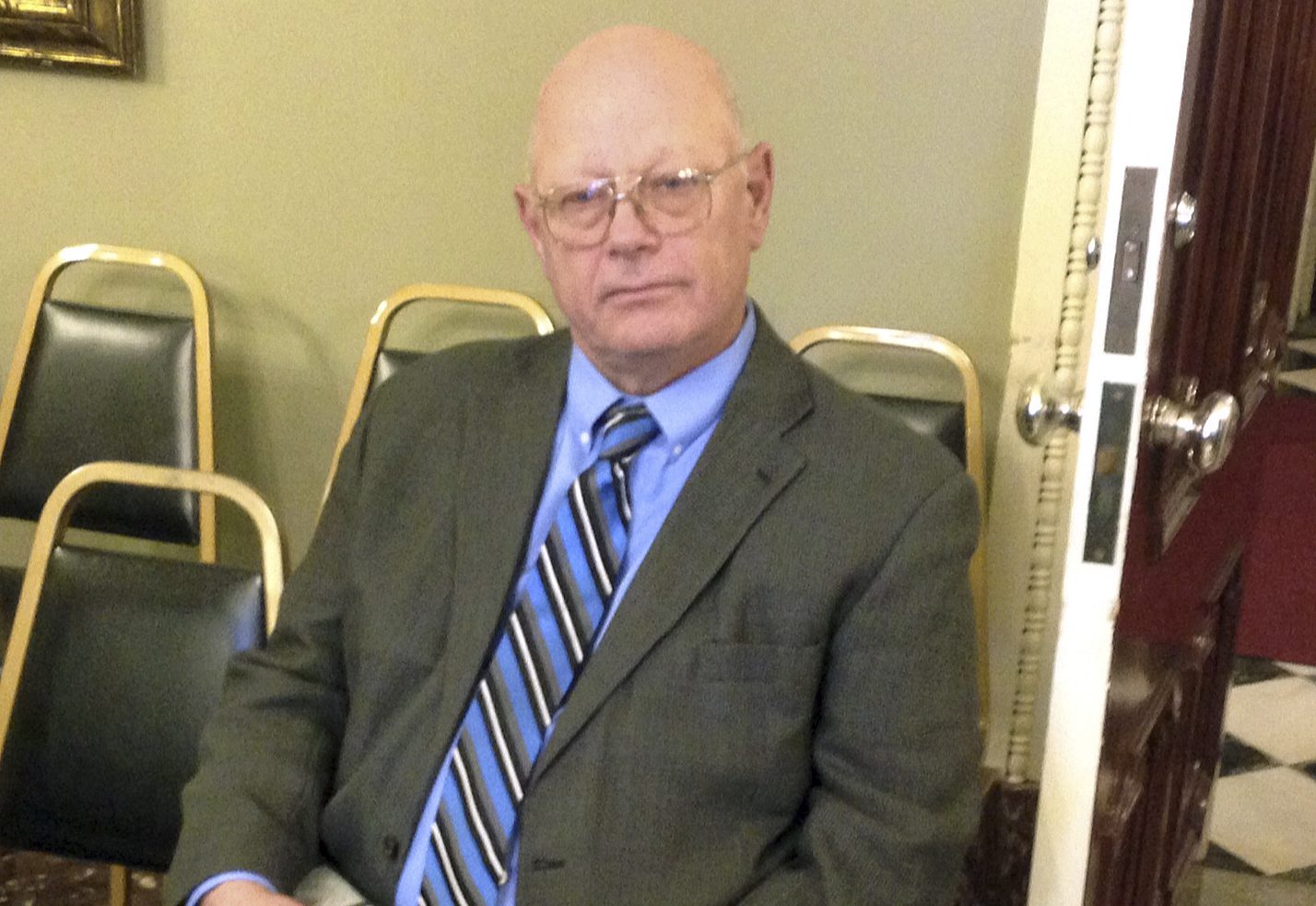 Former state Sen. Norm McAllister, R-Franklin, awaiting the start of the Vermont Senate's Rules Committee meeting in Montpelier, Vermont, December 16, 2015. (CREDIT: AP Photo/Dave Gram)