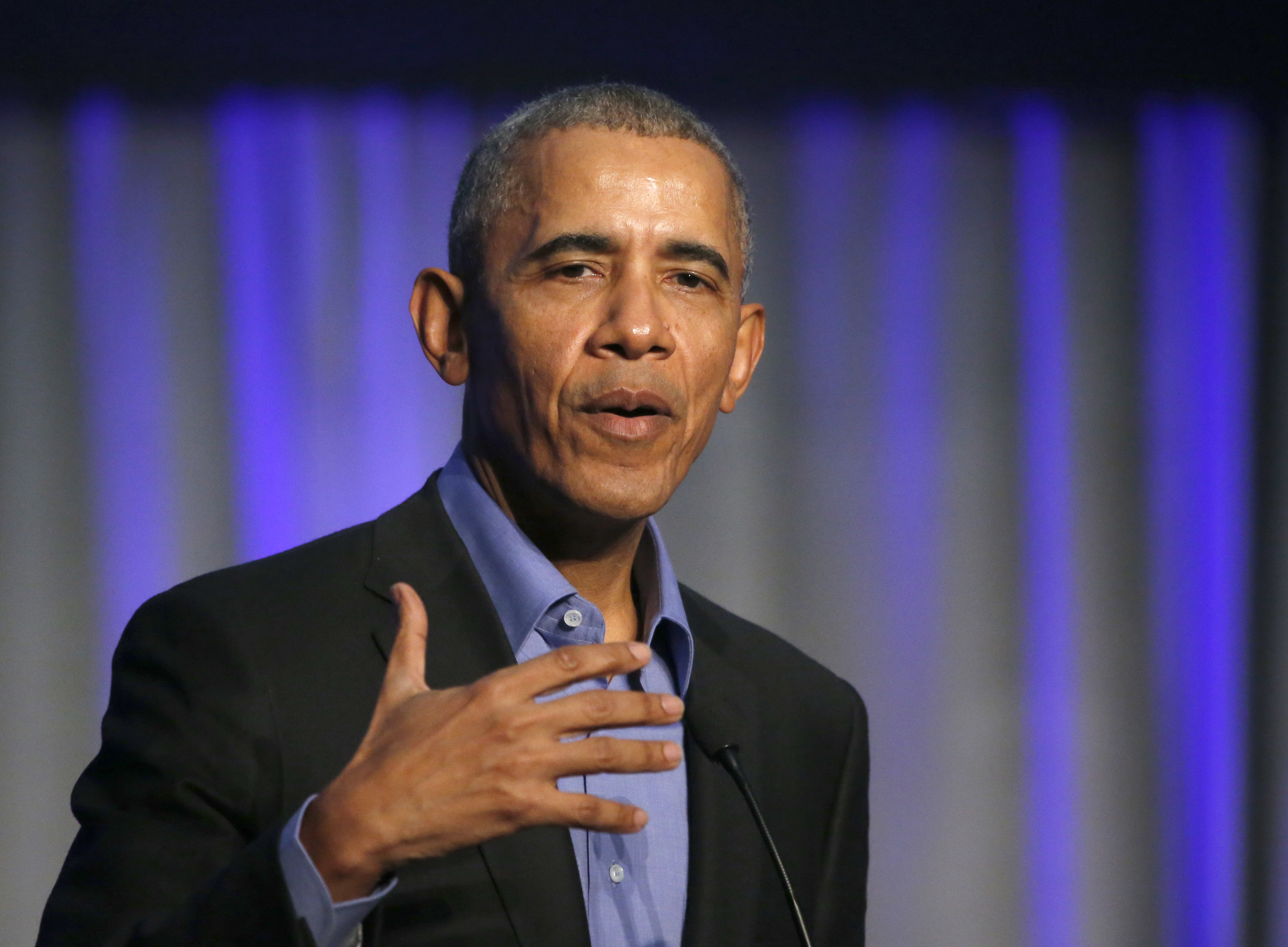Former President Barack Obama address the participants at a summit on climate change involving mayors from around the globe Tuesday, Dec. 5, 2017, in Chicago. (CREDIT: AP Photo/Charles Rex Arbogast)