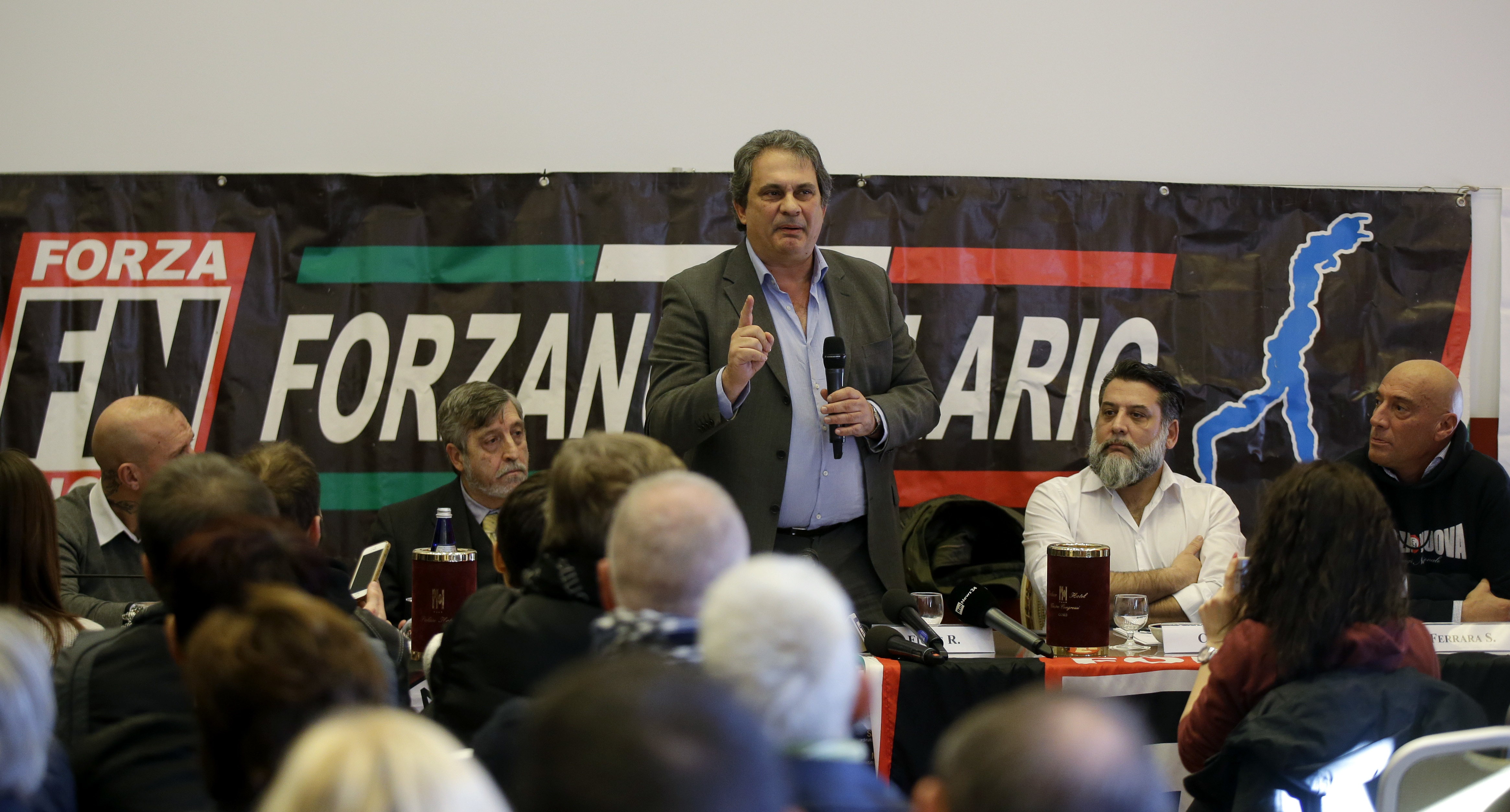Italy's neo-fascist Forza Nuova leader Roberto Fiore speaks during a press conference, in Como, Italy, Saturday, Dec. 9, 2017. (CREDIT: AP Photo/Luca Bruno)