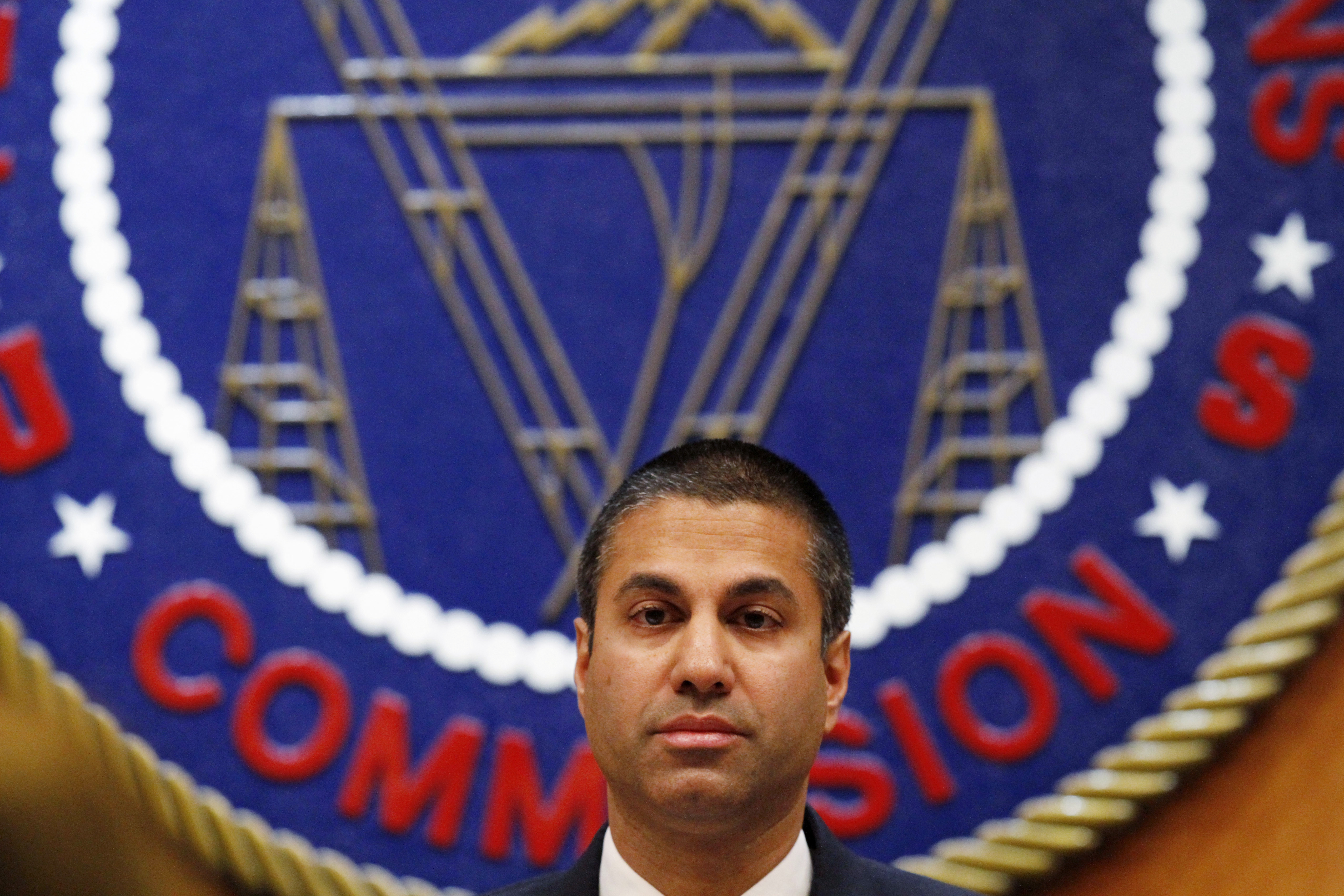 FCC Chairman Ajit Pai listens during Thursday's meeting. CREDIT: AP Photo/Jacquelyn Martin