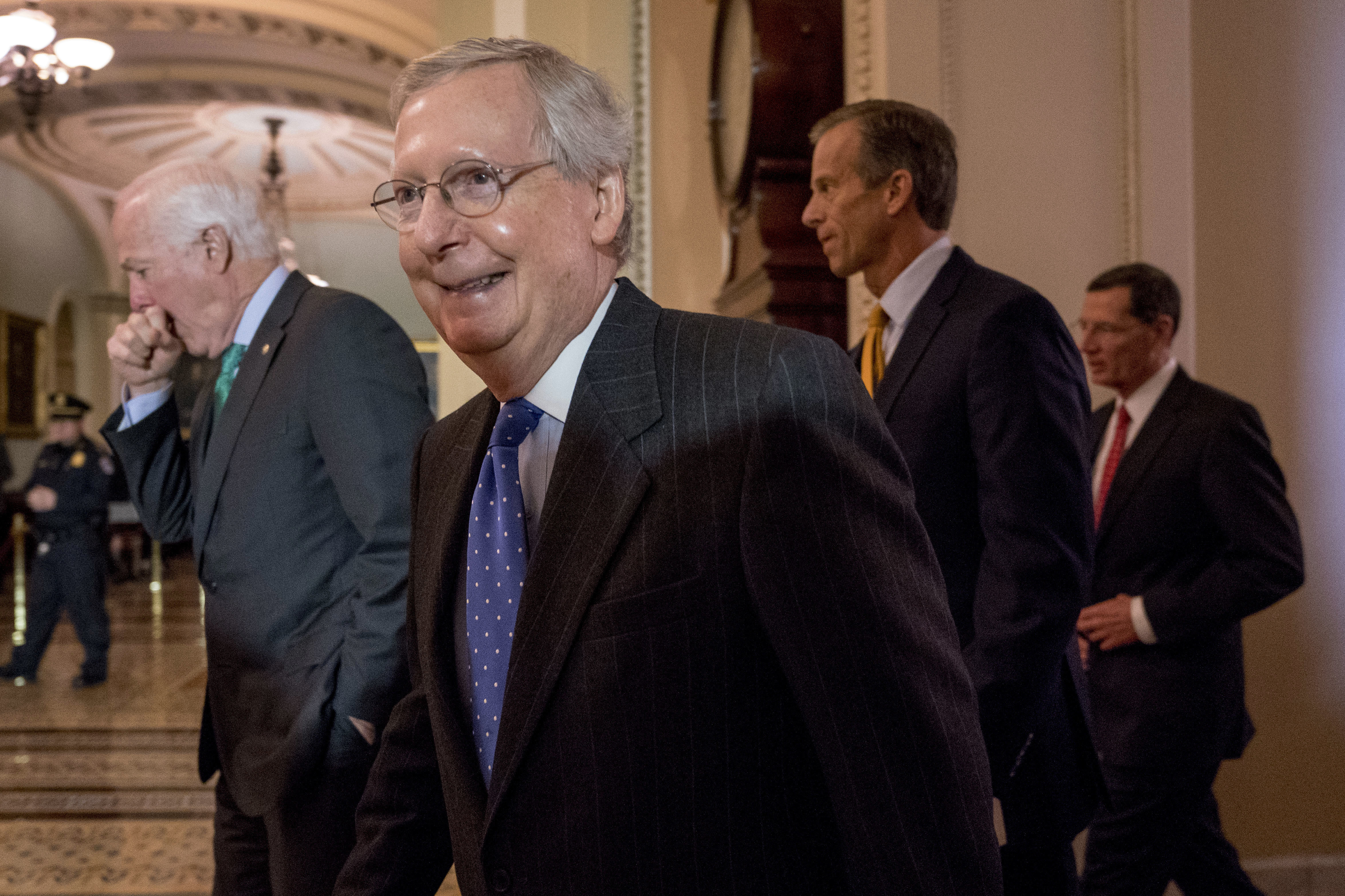 Sen. John Cornyn, (R-TX), Senate Majority Leader Mitch McConnell (R-KY), Sen. John Thune (R-SD), and Sen. John Barrasso (R-WY). CREDIT: AP Photo/Andrew Harnik
