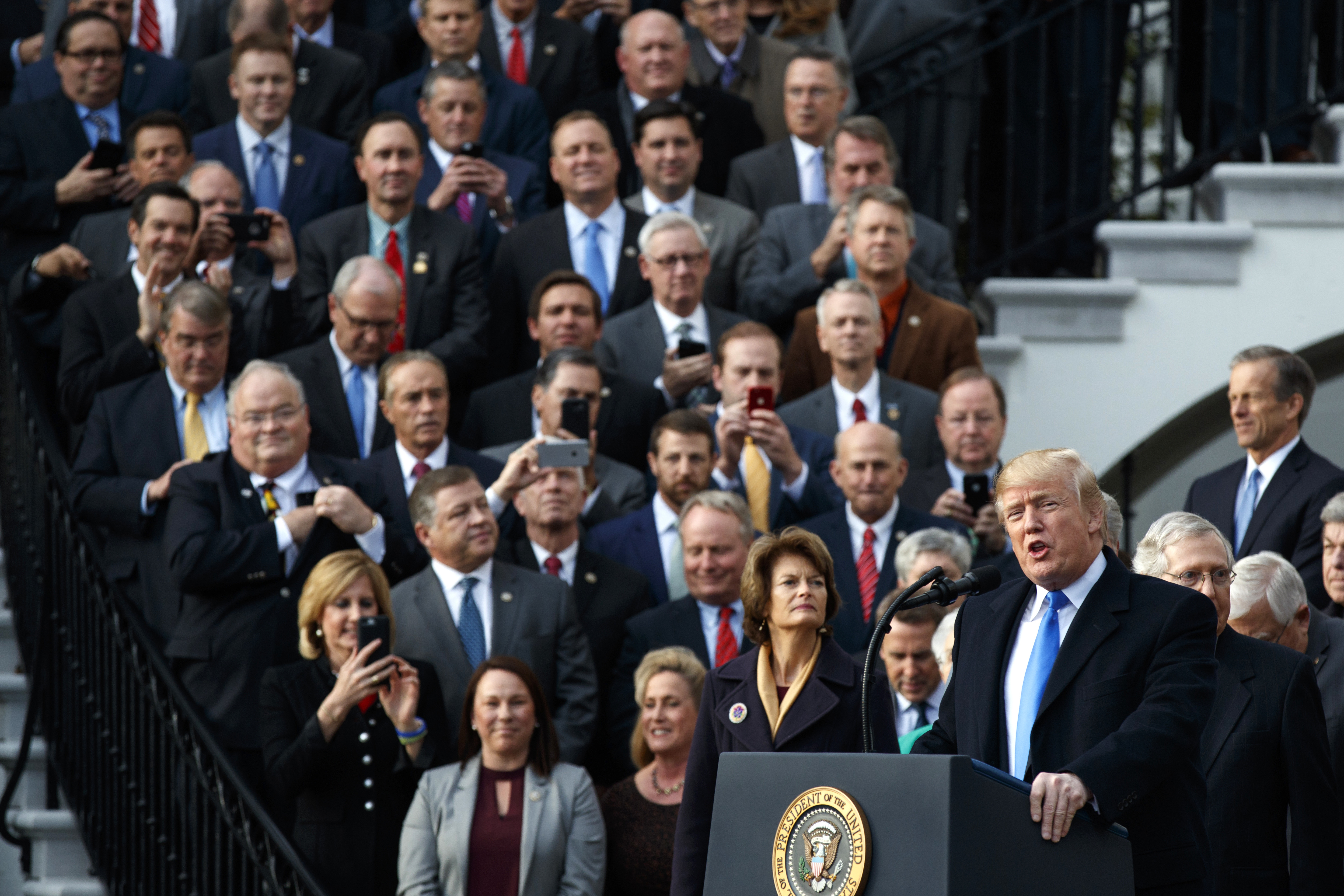 President Trump speaks during an event to acknowledge final passage of tax overhaul legislation by Congress. CREDIT: AP Photo/Evan Vucci