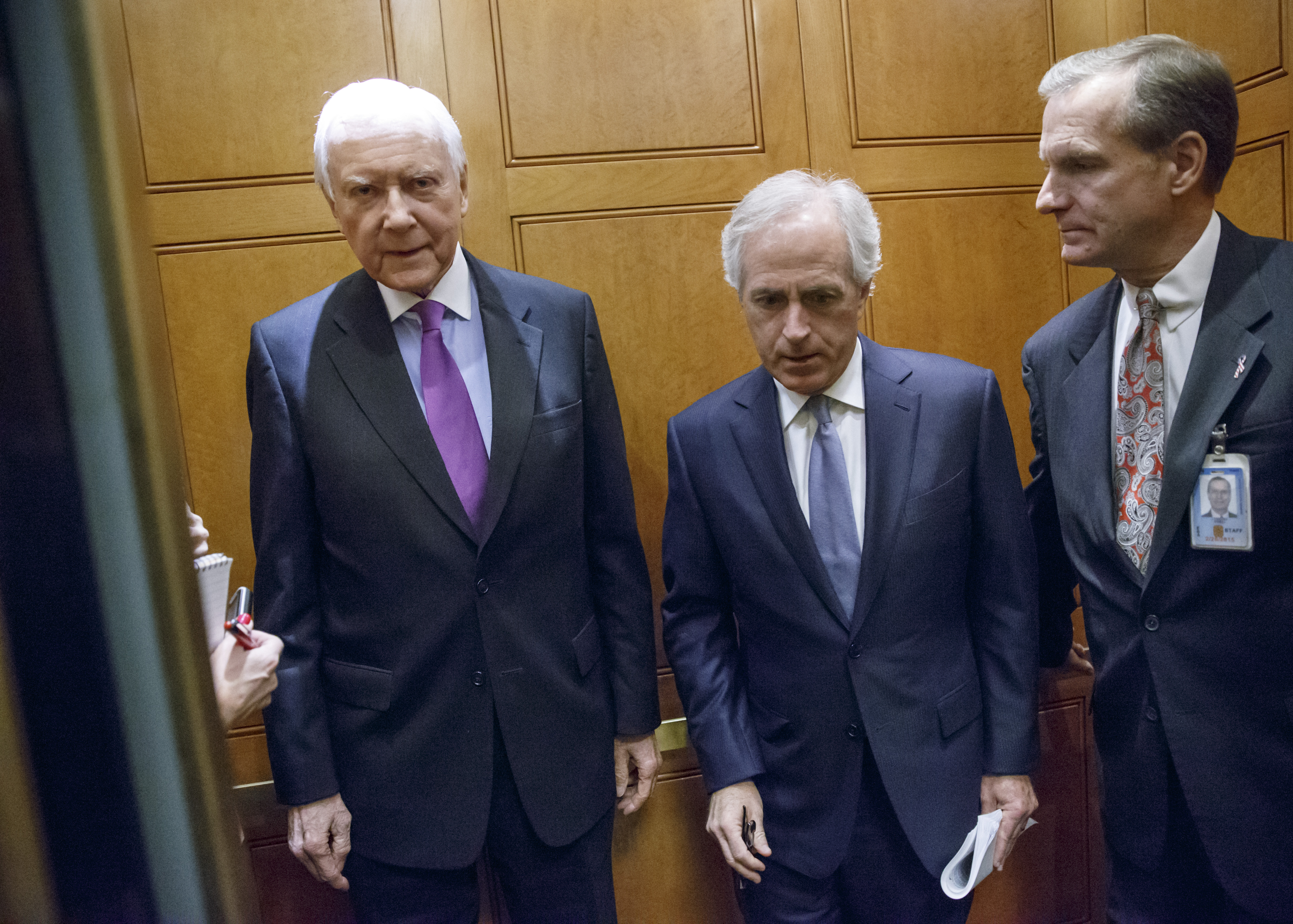 Sen. Orrin Hatch, R-Utah, left, and Sen. Bob Corker, R-Tenn., center, take an elevator to the Senate on Capitol Hill in Washington (CREDIT: AP Photo/J. Scott Applewhite)