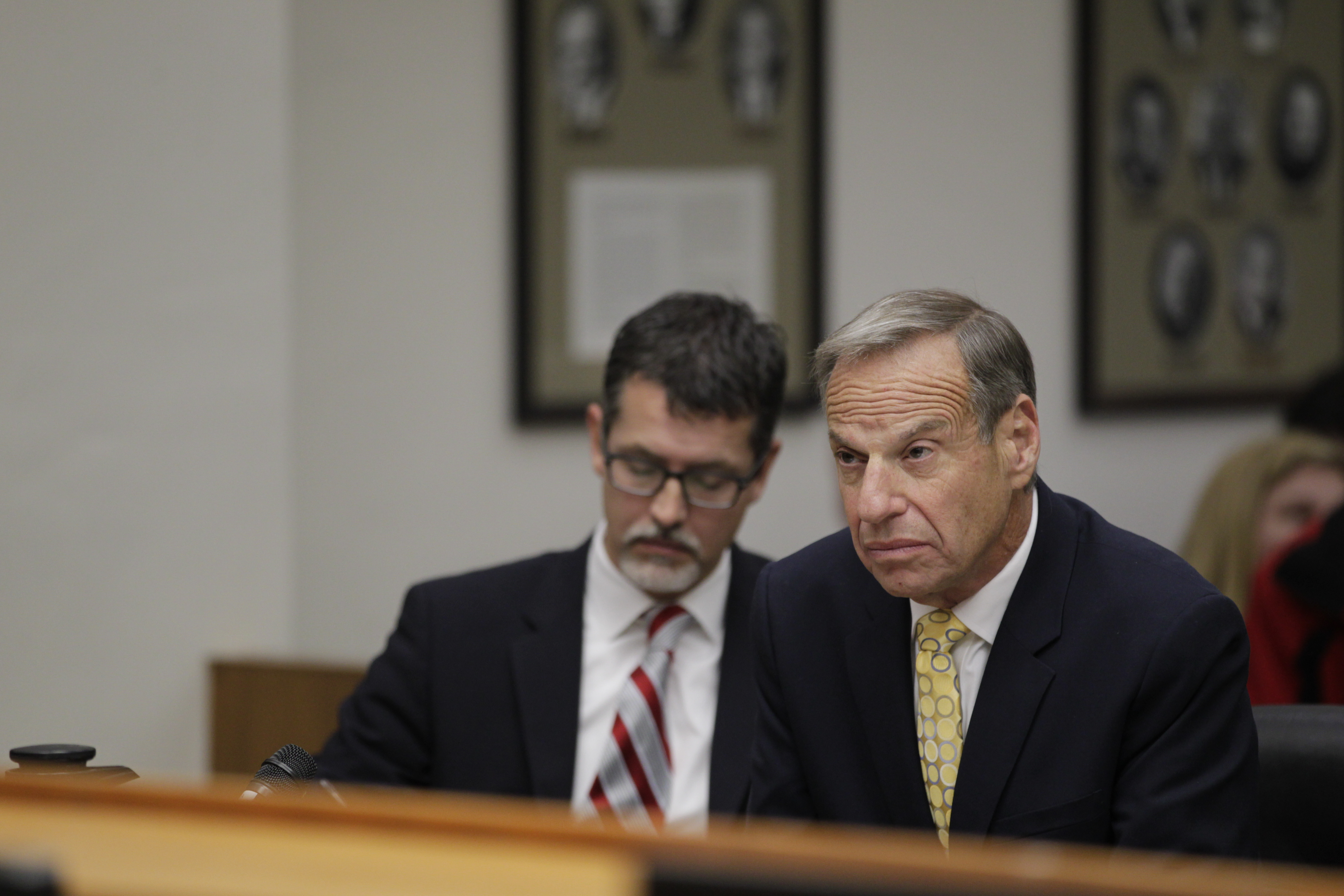 Former San Diego Mayor Bob Filner, right, sits with Earll Pott, a member of his defense team, in Robert J. Trentacosta's Superior Courtroom on Monday, Dec. 9, 2013 in San Diego. (CREDIT: AP Photo/U-T San Diego, John Gastaldo, Pool)