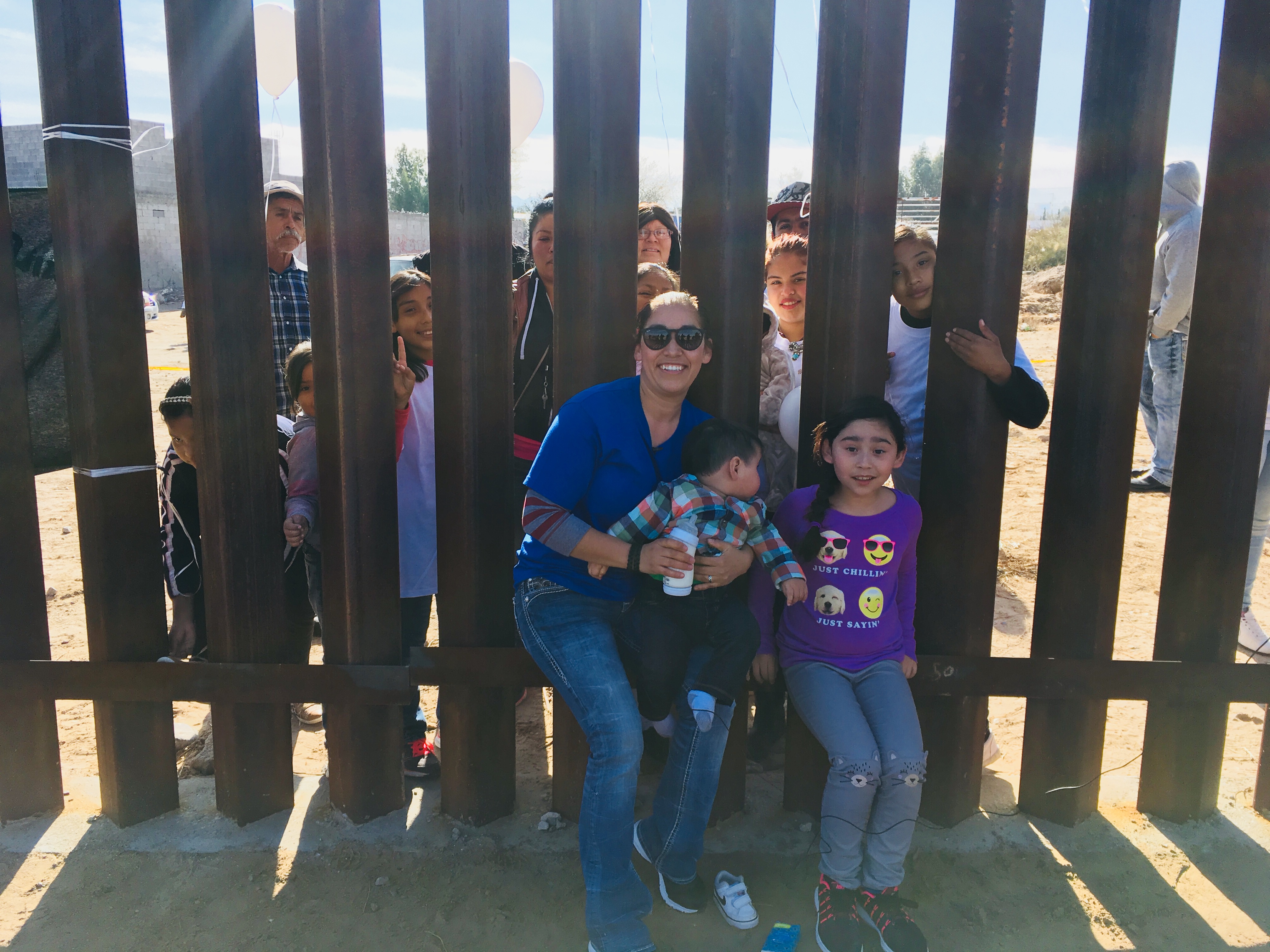 FAMILIES ON BOTH SIDES OF THE SOUTHERN U.S.-MEXICO BORDER MET BRIEFLY ON SUNDAY, DECEMBER 10 AT SUNLAND PARK, NEW MEXICO FOR AN EVENT CALLED "KEEP OUR DREAM ALIVE." (CREDIT: ESTHER Y. LEE)