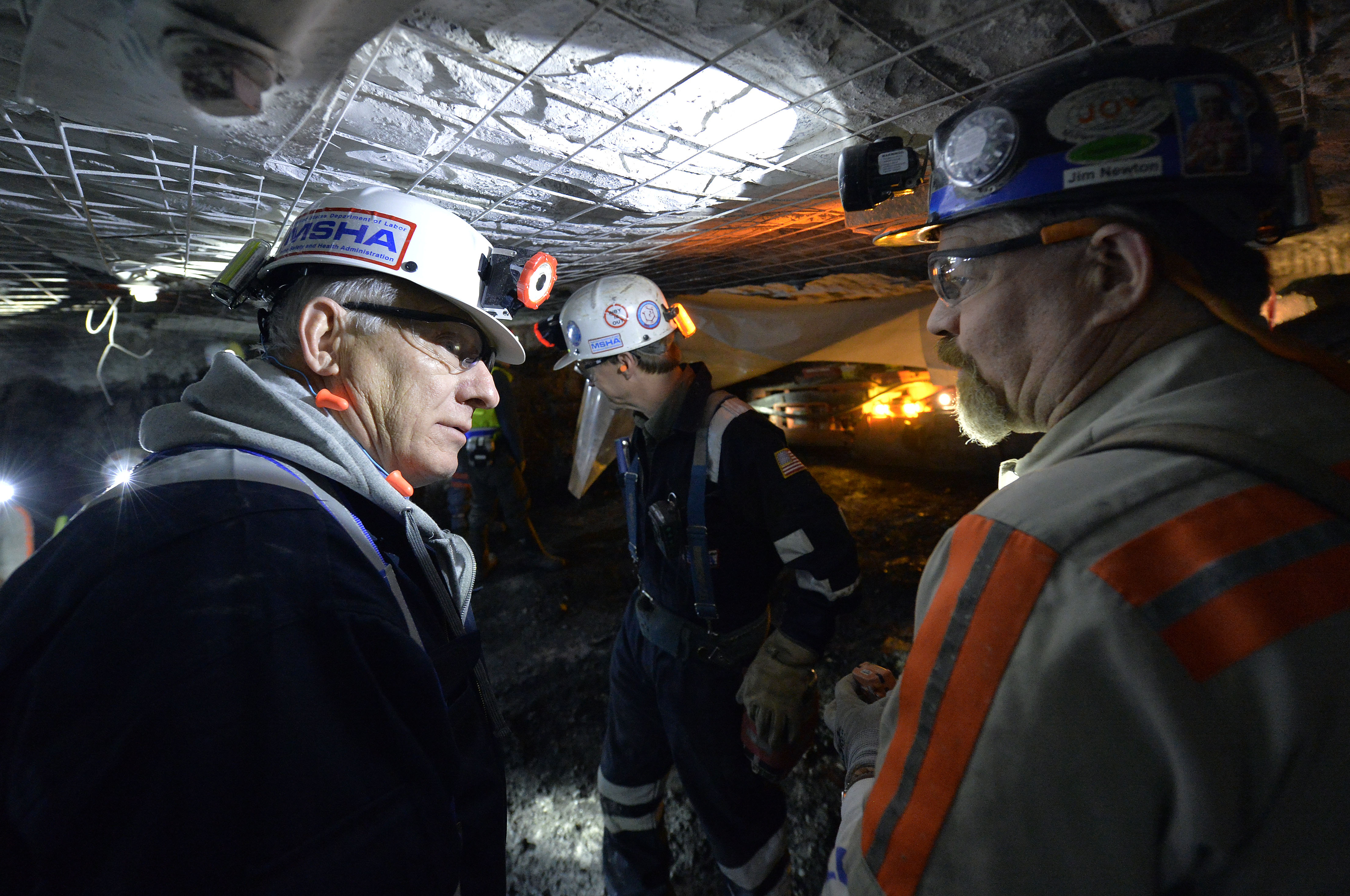 Joe Main, left, Assistant Secretary of Labor for Mine Safety and Health in the Obama administration, was a strong advocate for getting new rules in place to protect coal miners' health and safety. CREDIT: AP Photo/Timothy D. Easley