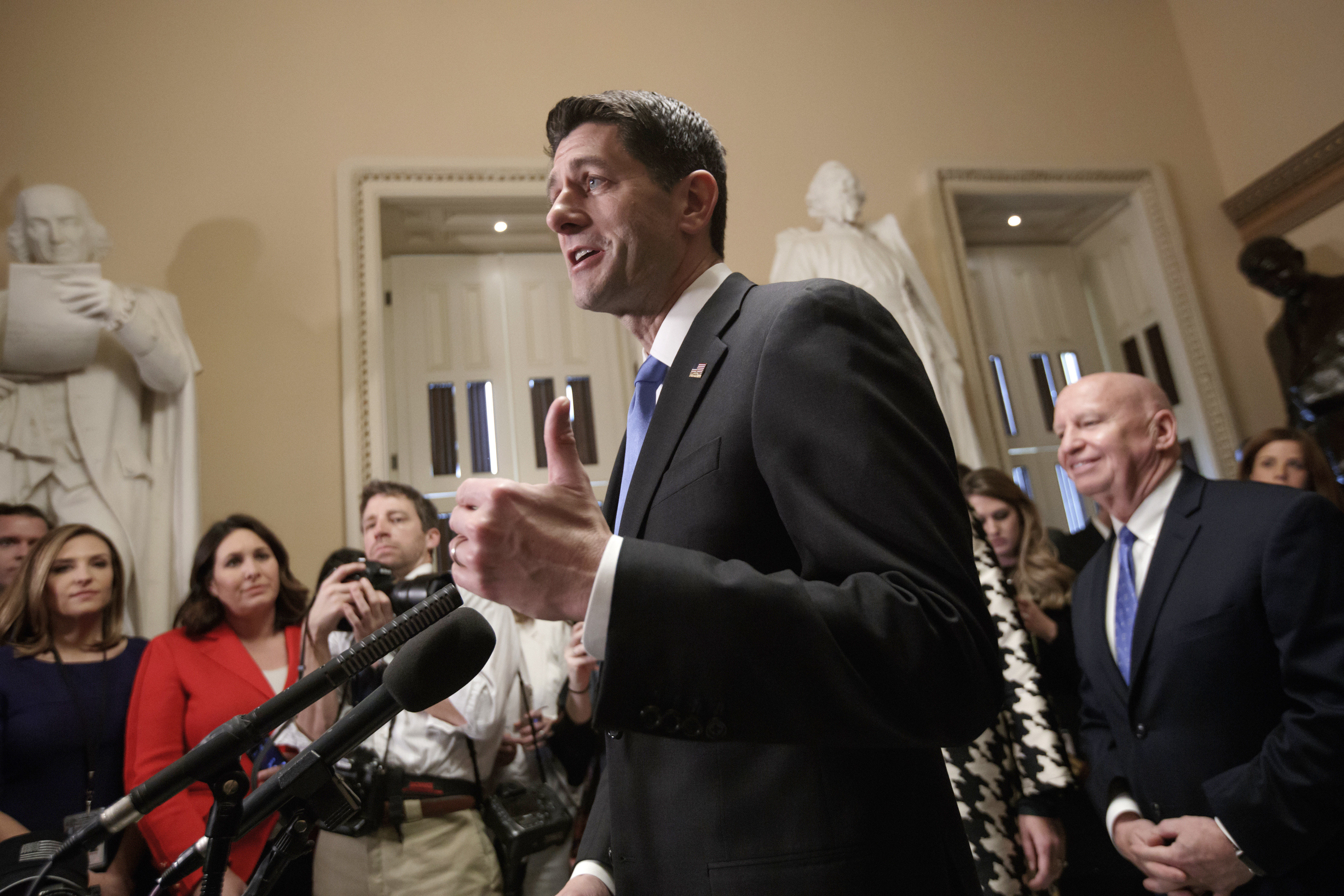 The vast majority of the Republican members of the Climate Solutions Caucus joined House Speaker Paul Ryan (R-WI) to pass a major overhaul of the nation's tax code on December 20, 2017, that benefits the wealthy and retains tax subsidies for oil and gas companies. CREDIT: AP Photo/J. Scott Applewhite