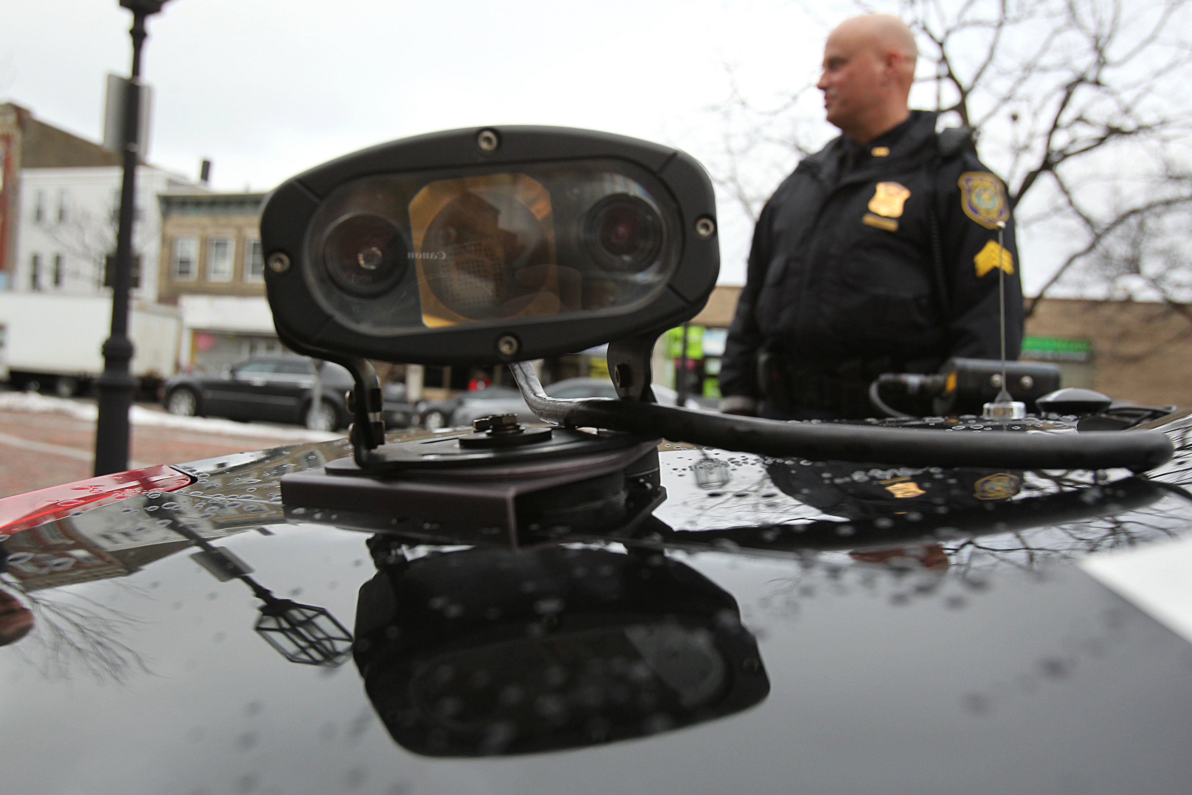 A rear camera mounted on the back of a Chelsea, Massachusetts police cruiser that can automatically read license plates. CREDIT Suzanne Kreiter/The Boston Globe via Getty Images