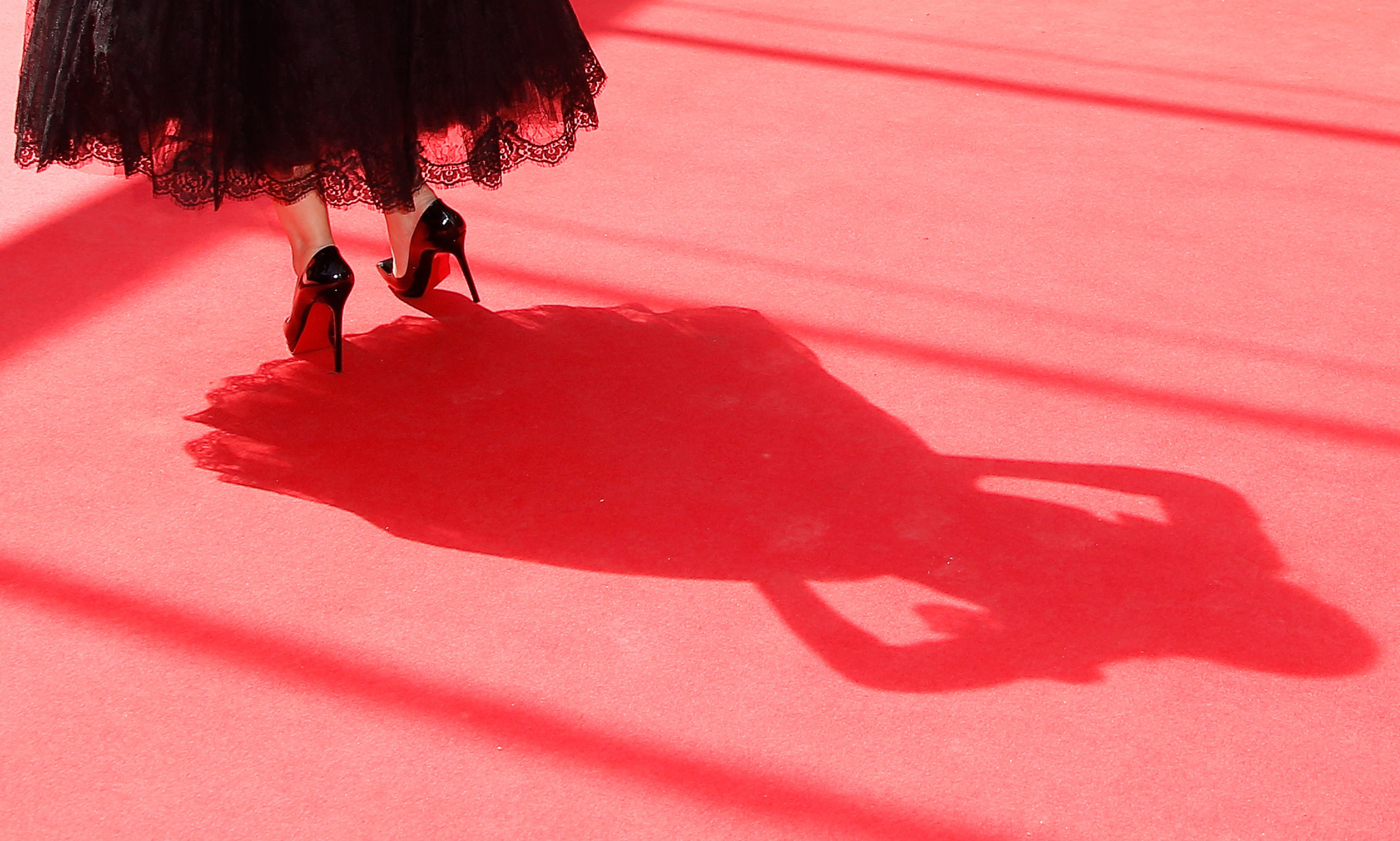 Italian actress Monica Bellucci poses as she arrives for the screening of the film "Le Meraviglie (The Wonders)" at the 67th edition of the Cannes Film Festival in Cannes, southern France, on May 18, 2014. CREDIT: AFP PHOTO / VALERY HACHE / AFP / VALERY HACHE (Photo credit should read VALERY HACHE/AFP/Getty Images
