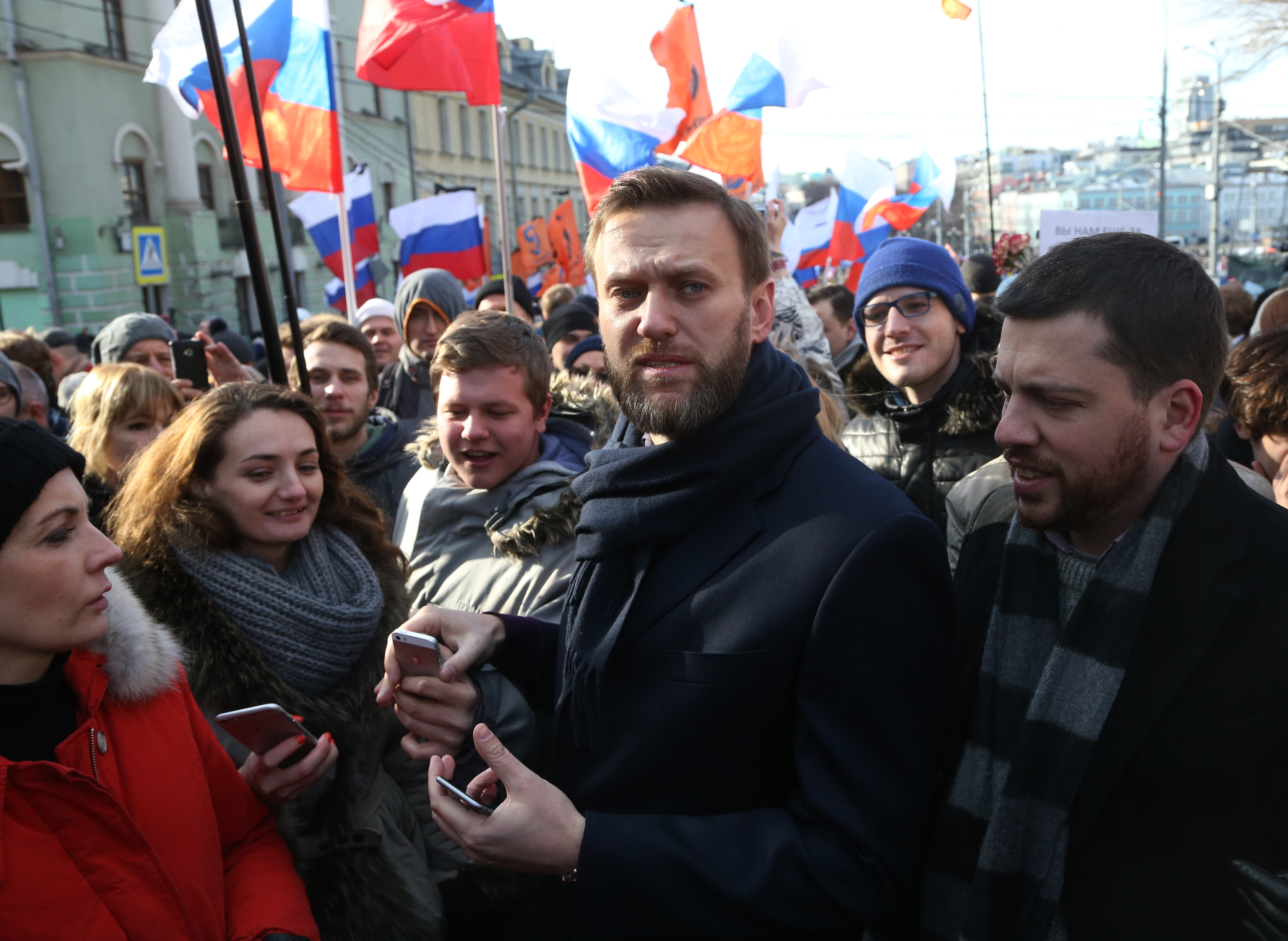 Russian opposition leader Alexei Navalny (C) attends a mass march marking the one-year anniversary of the killing of opposition leader Boris Nemtsov on February 27, 2016 in Moscow, Russia. CREDIT: Photo by Mikhail Svetlov/Getty Images