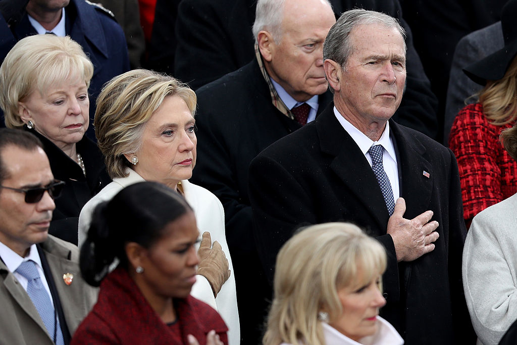 WASHINGTON, DC - JANUARY 20: Former Democratic presidential nominee Hillary Clinton and former President George W. Bush attend Donald Trump Inauguration on the West Front of the U.S. Capitol on January 20, 2017 in Washington, DC. (Photo by Joe Raedle/Getty Images)