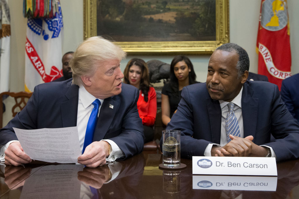 President Donald Trump with HUD Secretary Ben Carson. CREDIT: Michael Reynolds - Pool/Getty Images