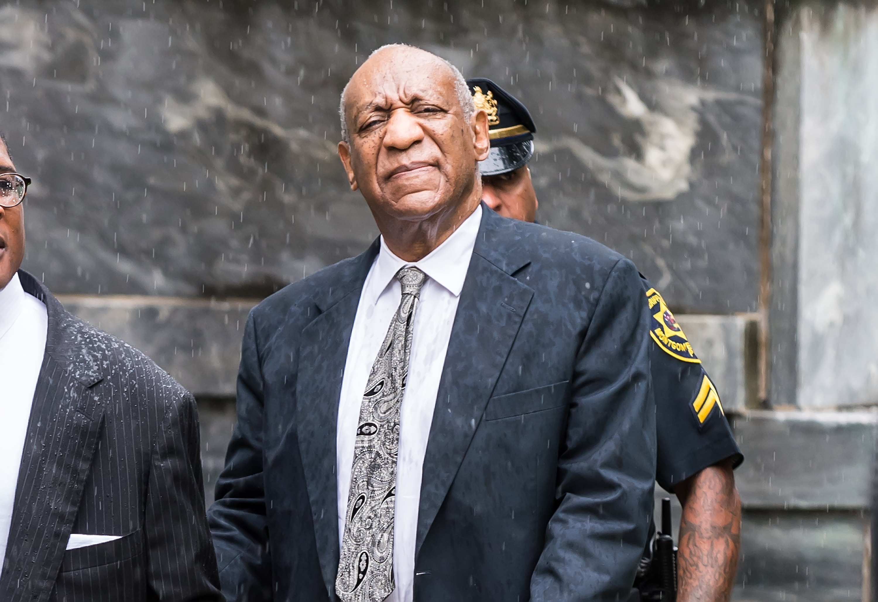 Bill Cosby is seen leaving Montgomery County Courthouse after the sexual assault case was declared a mistrial for manifest necessity on June 17, 2017 in Norristown, Pennsylvania. CREDIT: Gilbert Carrasquillo/WireImage
